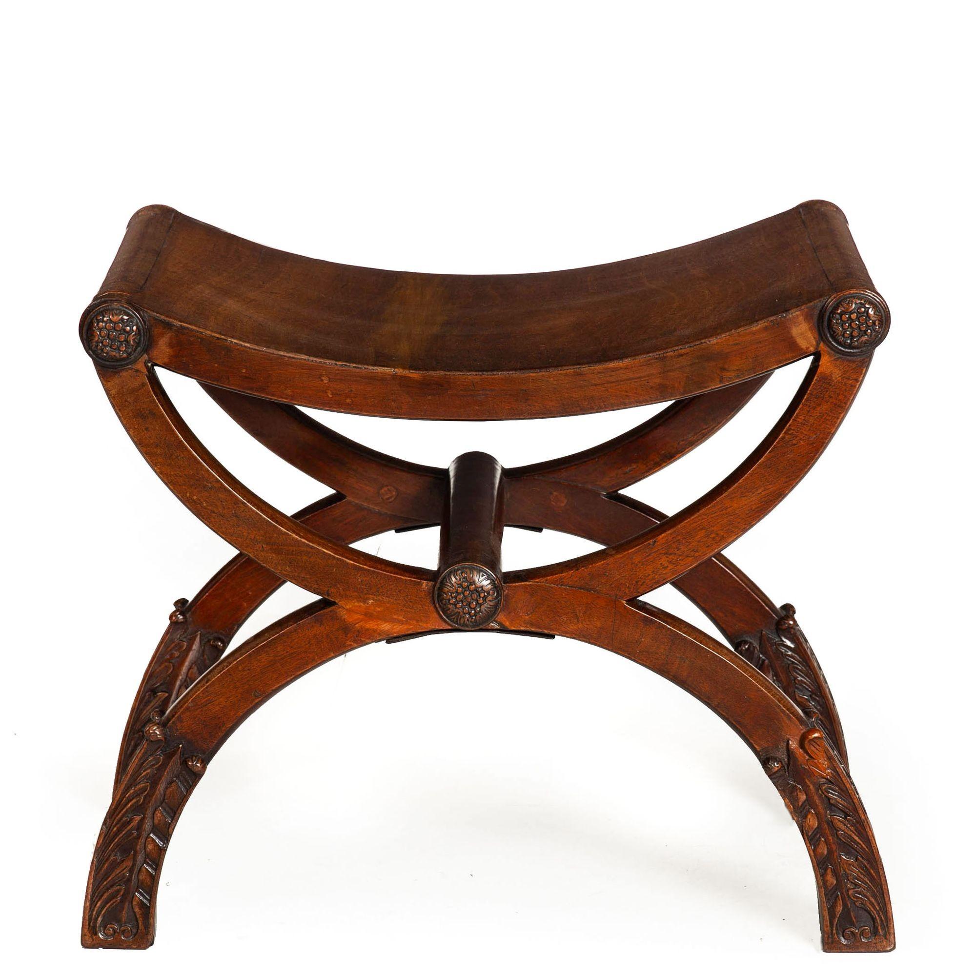 FINE REGENCY CARVED MAHOGANY CURULE BENCH
England, circa 1815
Item # 403PHK02S

Inspired by Greek antiquity, the present example is a very finely made 