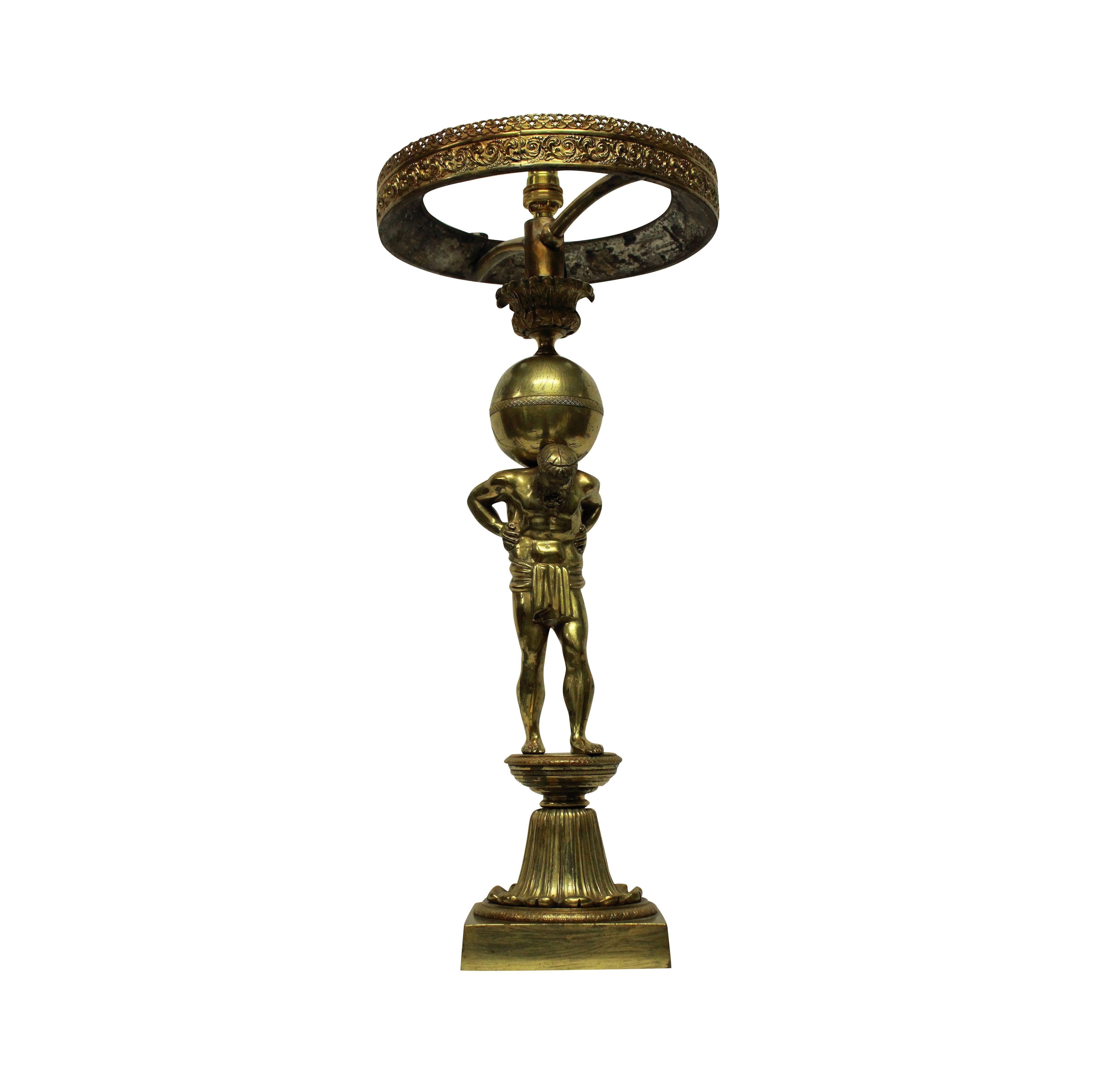 A fine English gilt bronze lamp depicting Atlas, holding up the earth. Formerly for oil, now electrified.