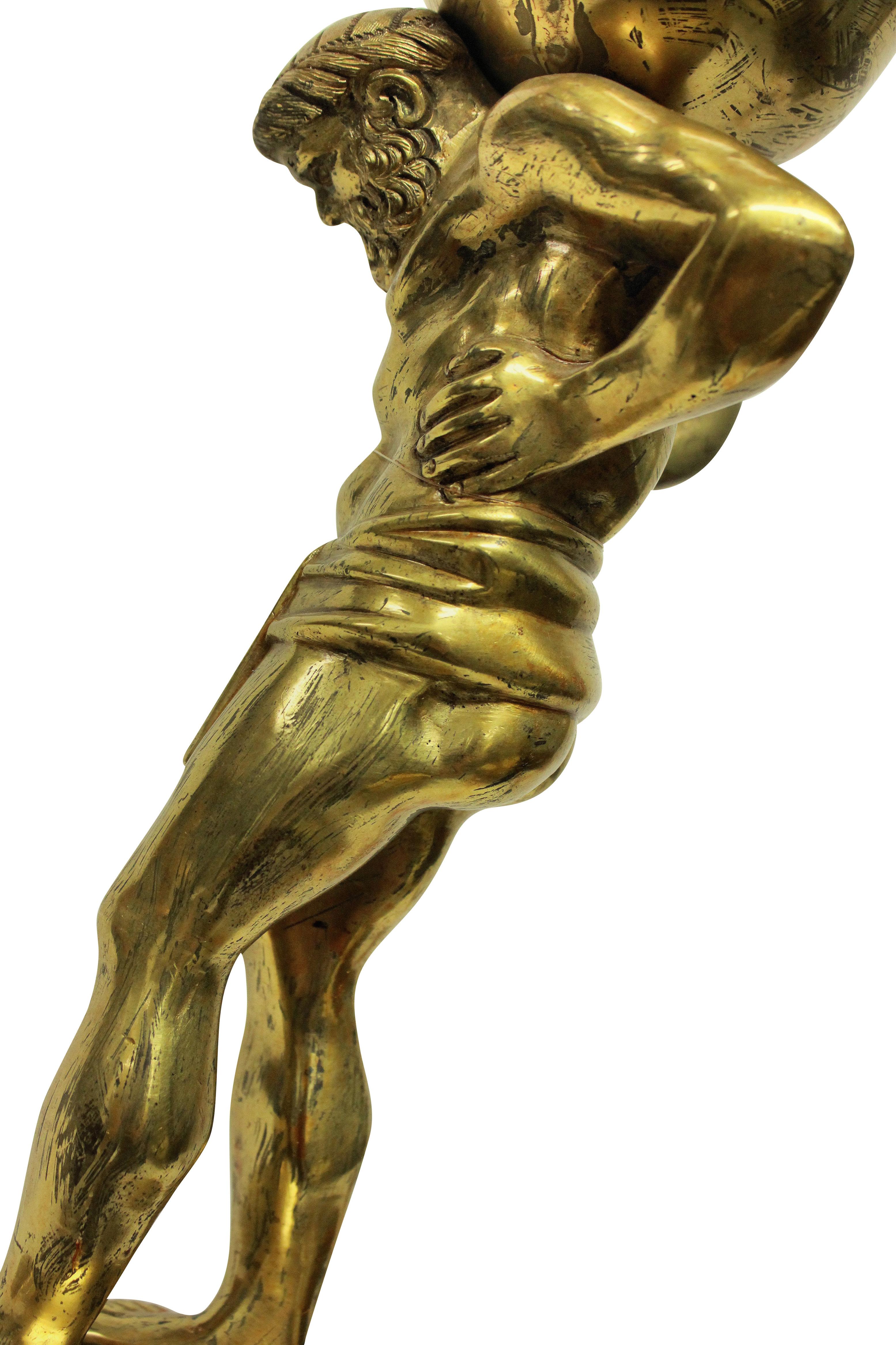 A fine English gilt bronze lamp depicting Atlas, holding up the earth. Formerly for oil, now electrified.
