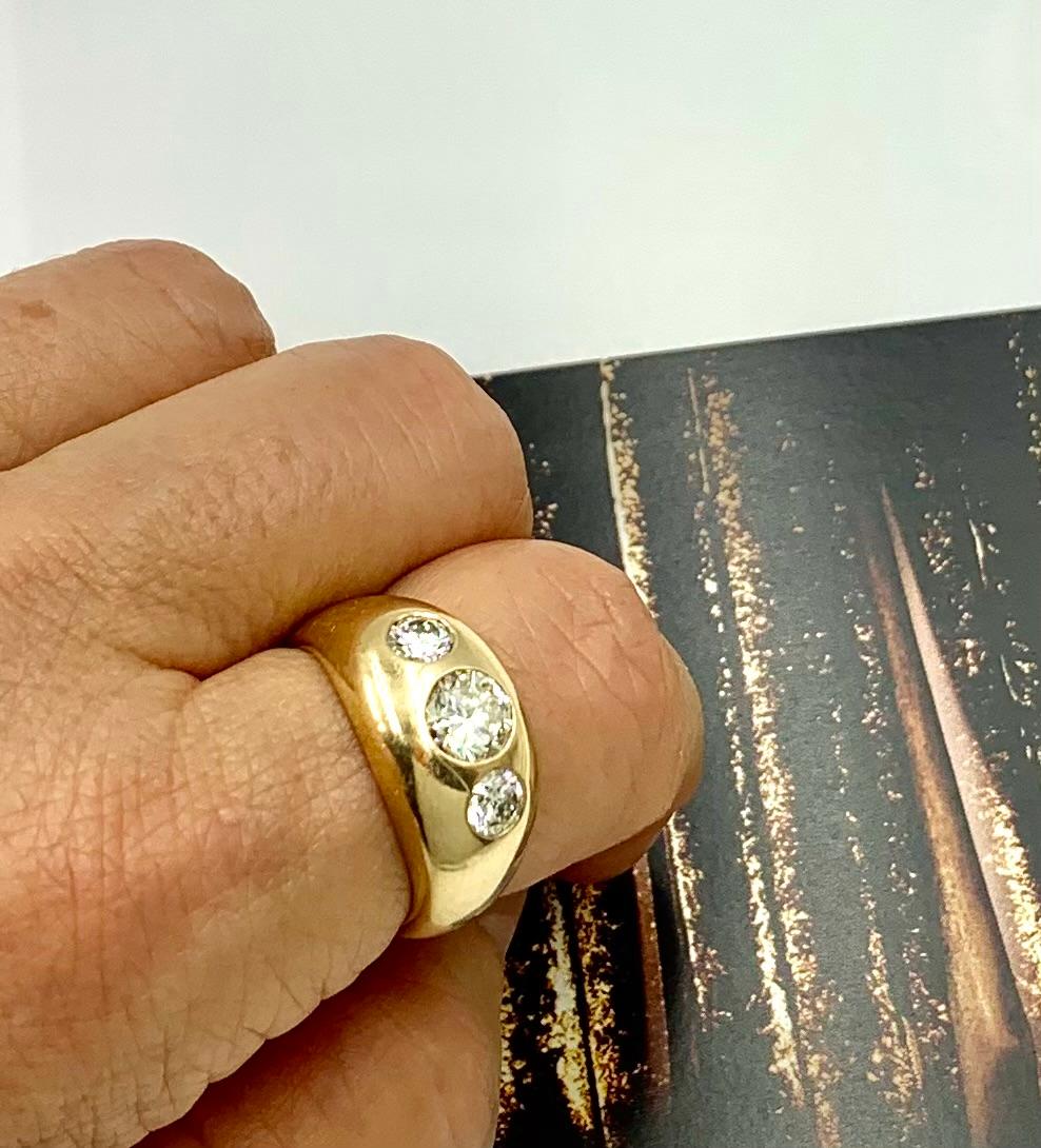 Fine estate 1.71 TCW diamond and 14K yellow gold three stone gypsy ring
20th Century
Unusual, attractive substantial 14K yellow gold gypsy setting perfectly complements the three beautiful high quality diamonds. Classic and a pleasure to wear. Three