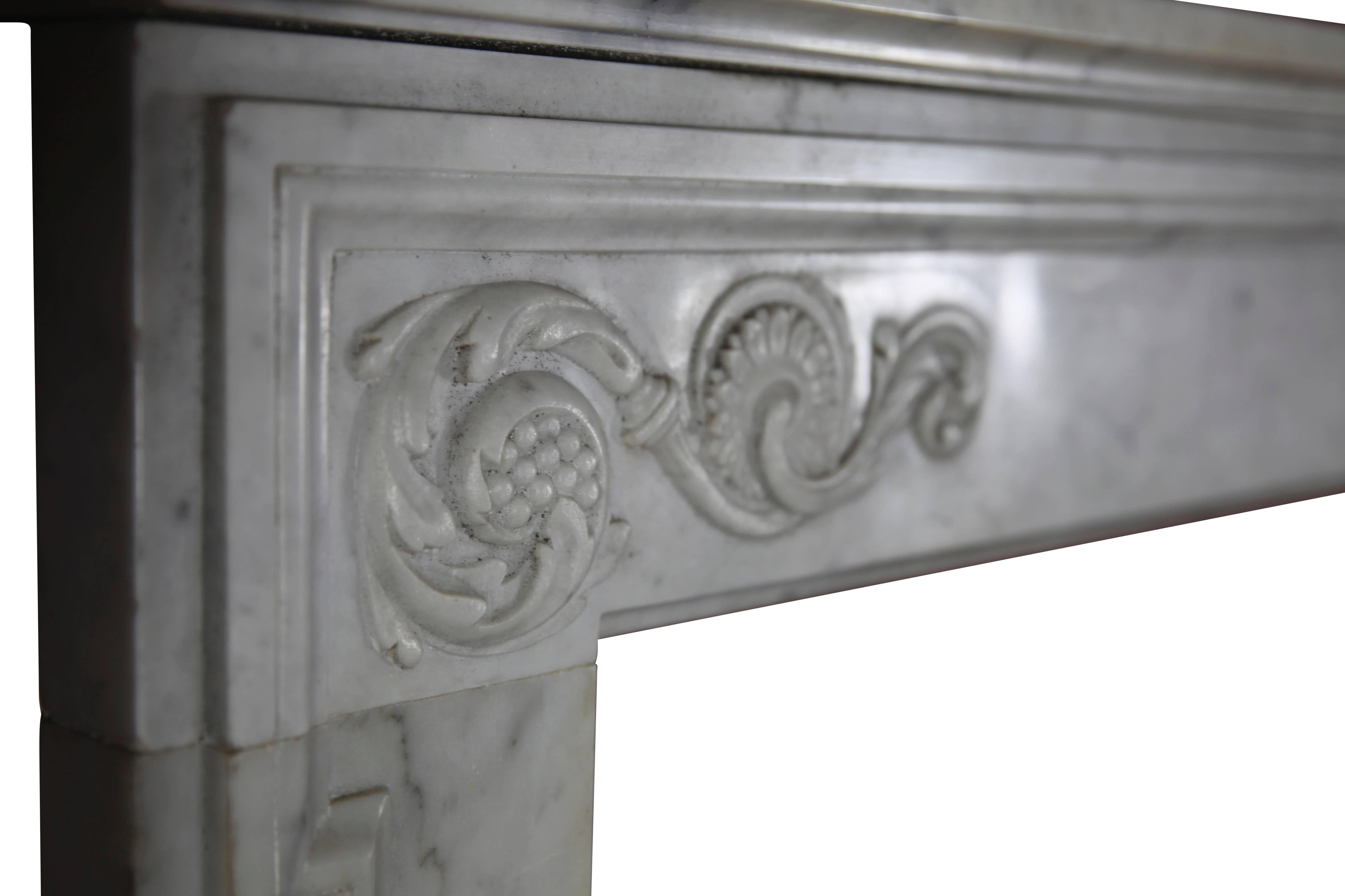 An elegant original vintage fireplace mantel (fireplace) with some nice and discrete carving on front and jambs.
Measures:
150 cm EW 59.06”.
107 cm EH 42.13”.
116 cm IW 45.66”.
88 cm IH 34.64”.
28 cm S 11.02”.
 