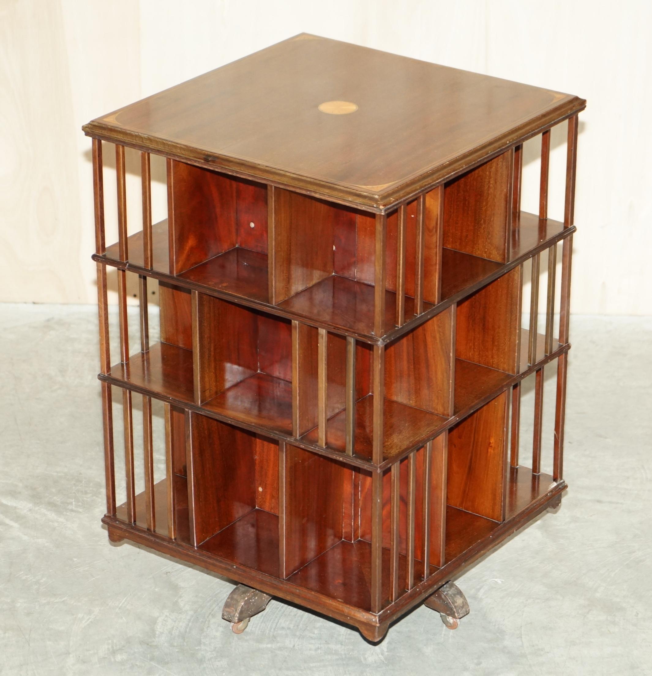 We are delighted to offer for sale this very fine, extra large, antique Sheraton Revival Mahogany & Satinwood revolving bookcase table

A very good looking well made and decorative piece. Made in the Sheraton revival style with wonderful inlay and