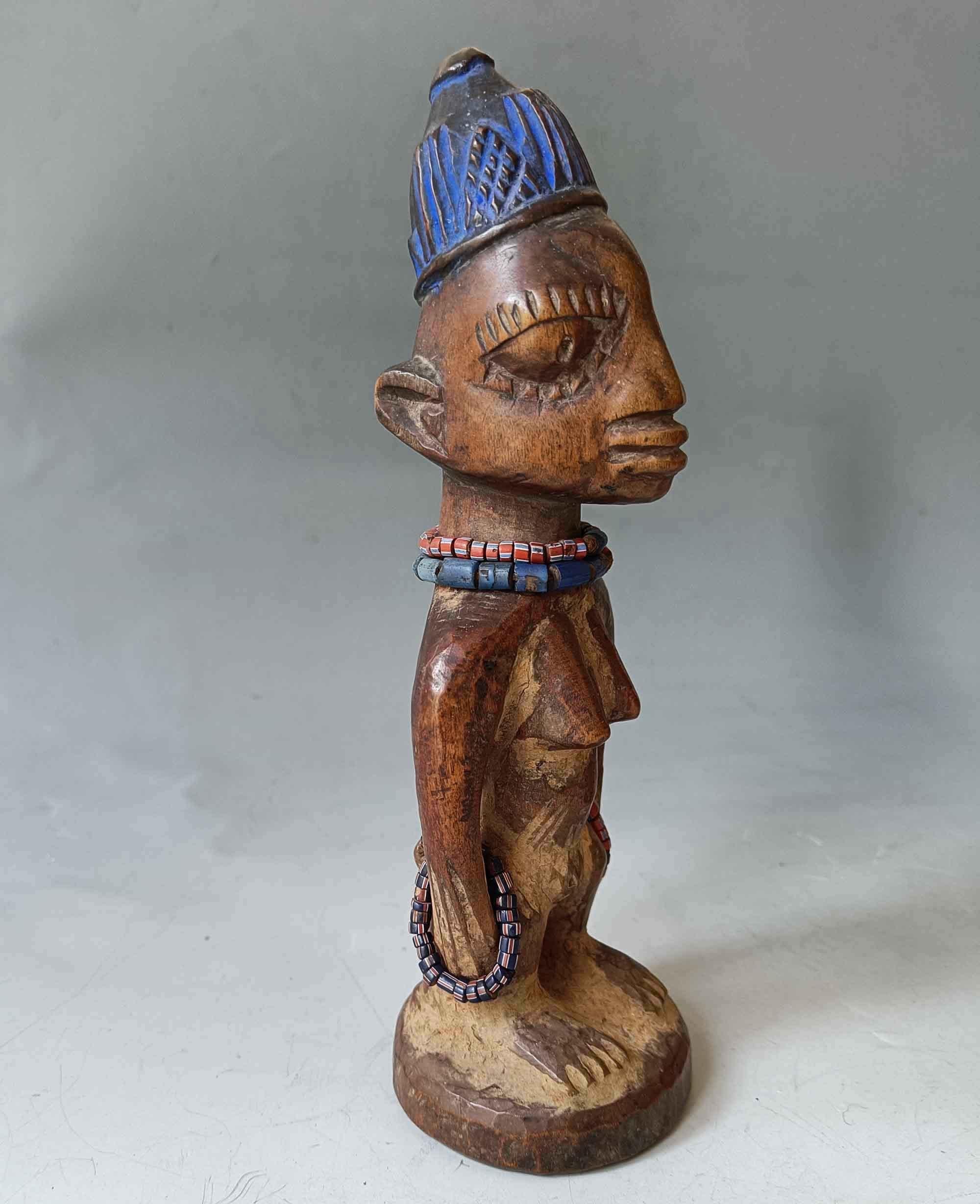 
African tribal Art Antiques Female Ibeji figure Yoruba Nigeria

A Finely carved  Ibeji Figure from early 20th century,

Measure: Height 27 cm.

Provenance: UK Collection.

 
Ibeji figures are small commemorative wood carvings that were made by the