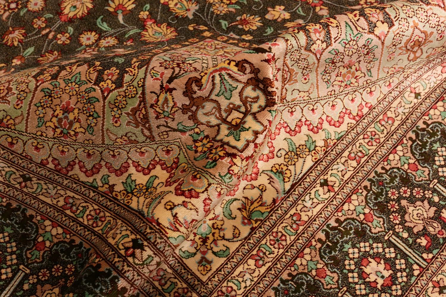 Fine Floral Silk Vintage Persian Qum Rug , Country of Origin / Rug Type: Vintage Persian Rug, Circa Date: Late 20th Century - Size: 4 ft 4 in x 6 ft 6 in (1.32 m x 1.98 m).