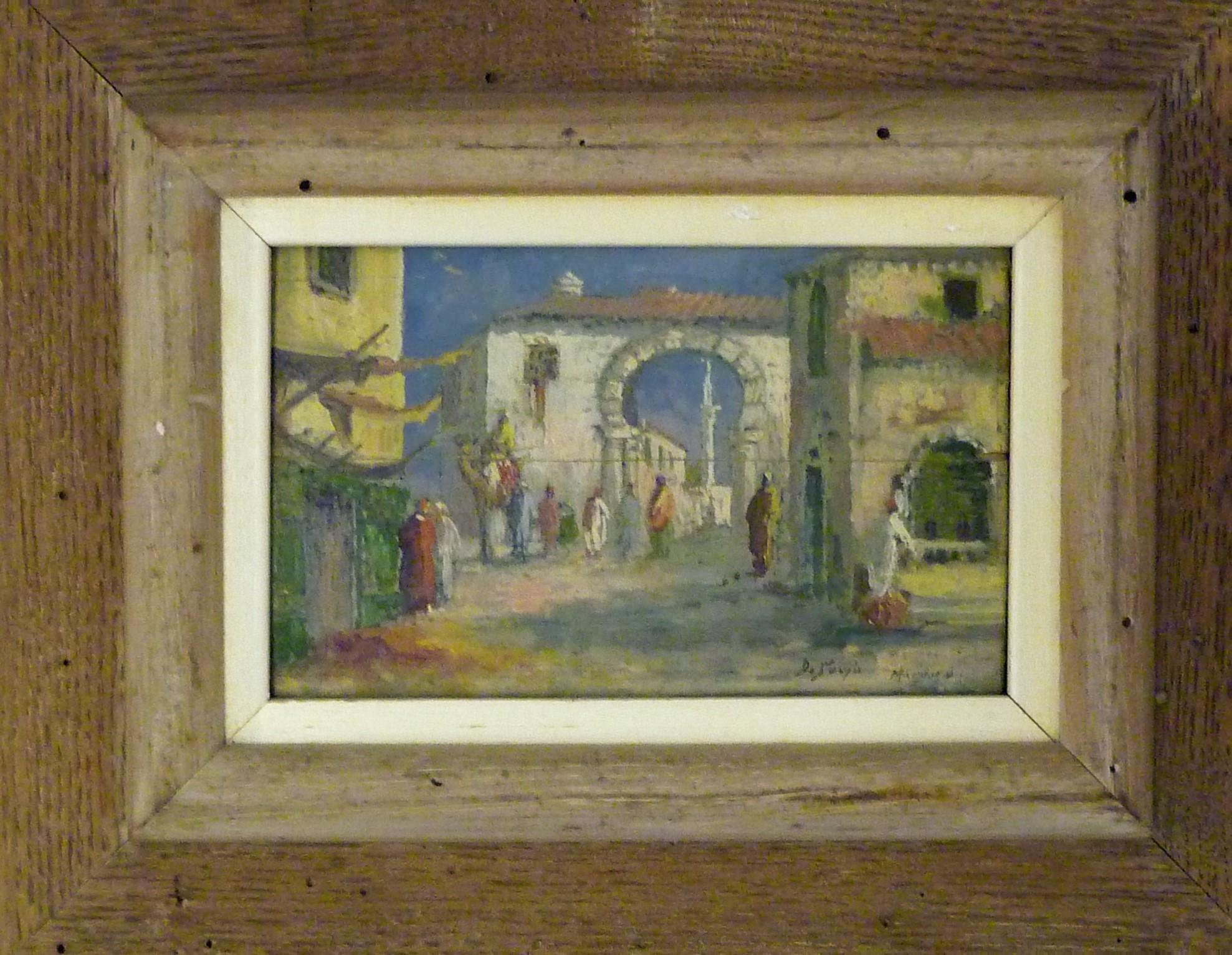 Fine 1930s framed orientalist painting of Marrakech or Morocco. A street scene, in oil painted on board (wood). Signed lower left. Appears to be DoSousa and Marrakech but is however slightly illegible. The painted board has a horizontal crack in the