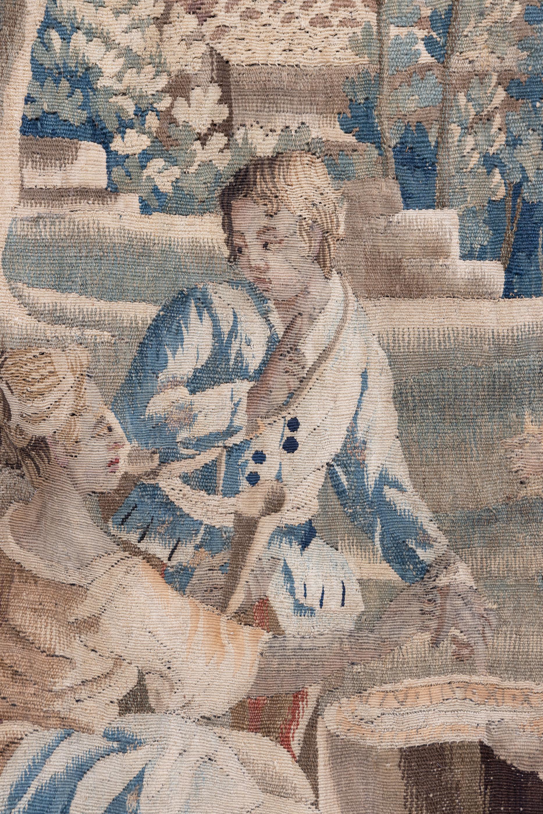 Fine French 18th century Aubusson tapestry with country family pictured in foreground of pastoral scene, with bridge and house in background.

This piece is a collection of a fourth generation, family owned business in New Orleans called The French