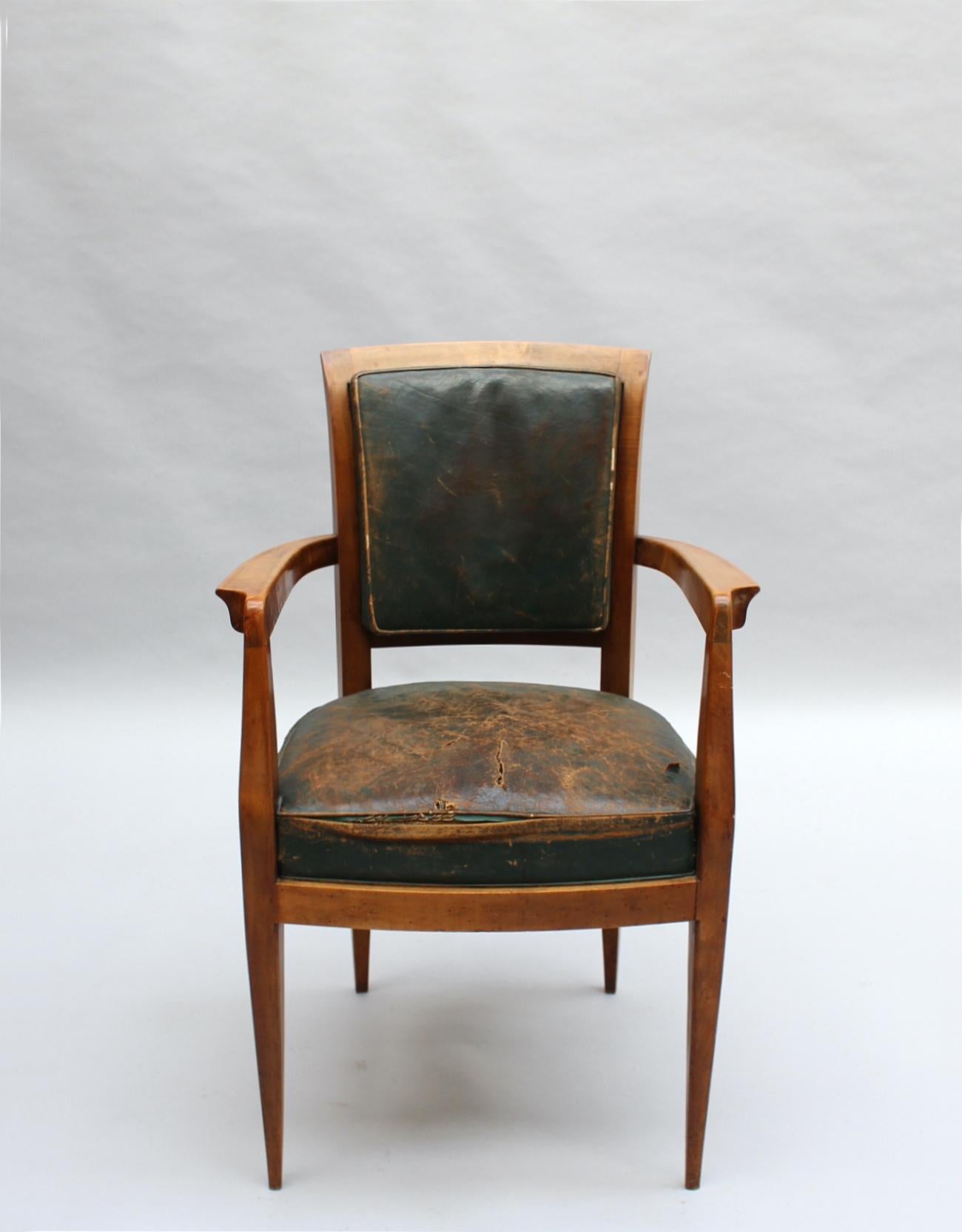 A fine French Art Deco patinated beech armchair attributed to Alfred Porteneuve.