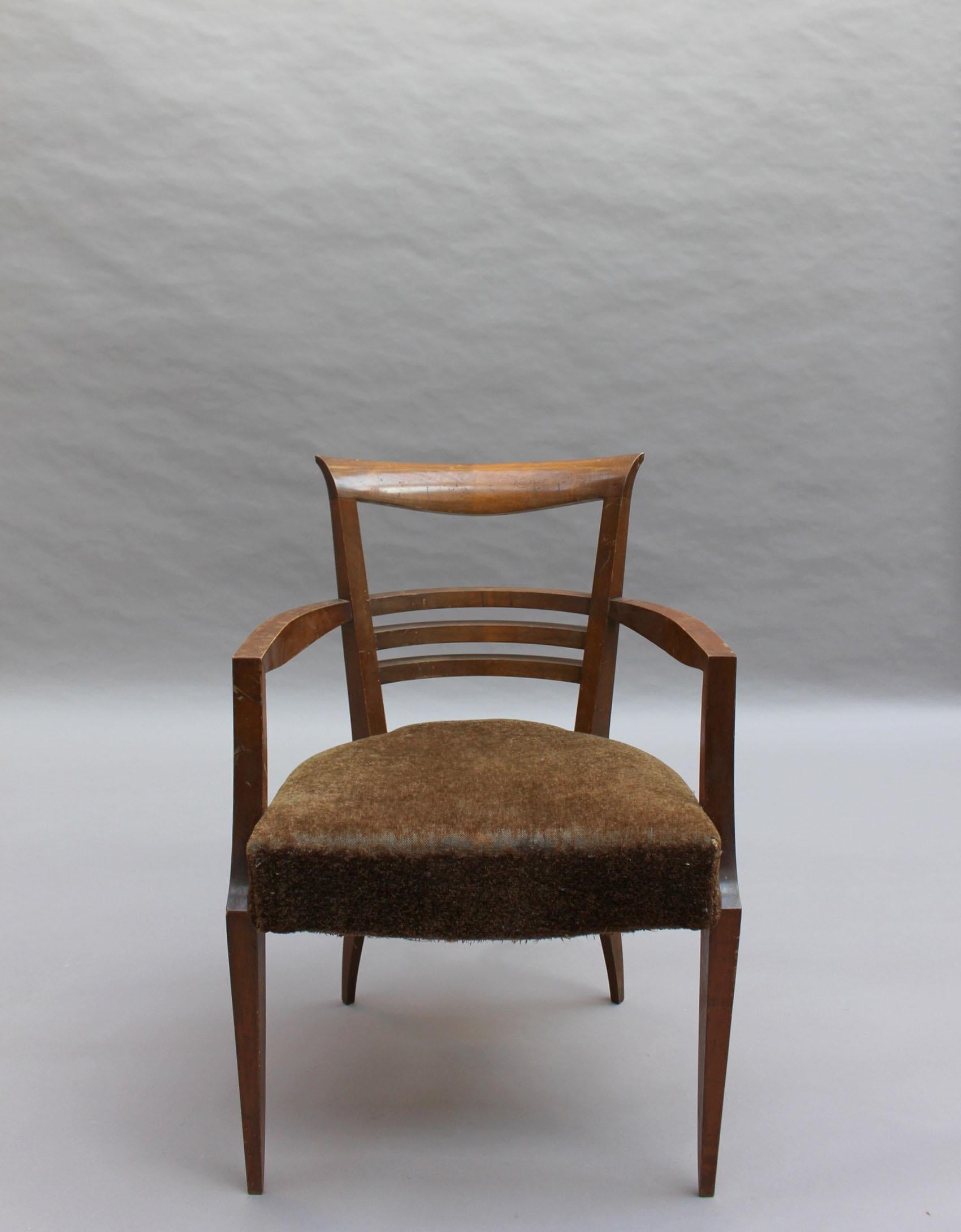 A fine French Art Deco stained beech armchair.
       