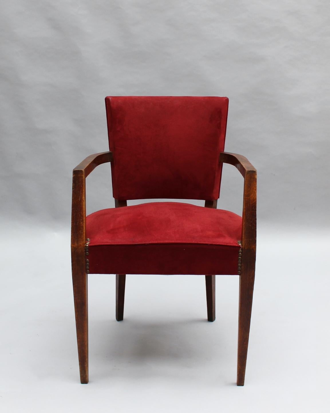 A fine French Mid-Century oak desk/bridge armchair.

