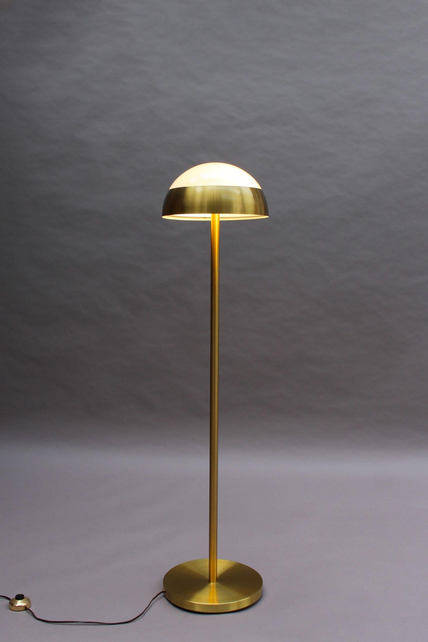 Atelier Perzel - Fine French mid-century floor reading lamp with a brass base and a brass and enameled white glass shade.
 