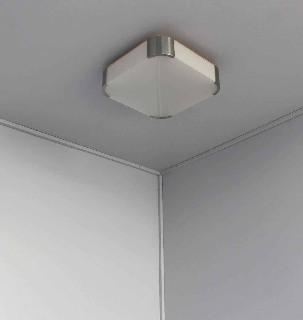 Jean Perzel: Fine French midcentury square laminated white glass flush mount or sconce with rounded nickel corners.