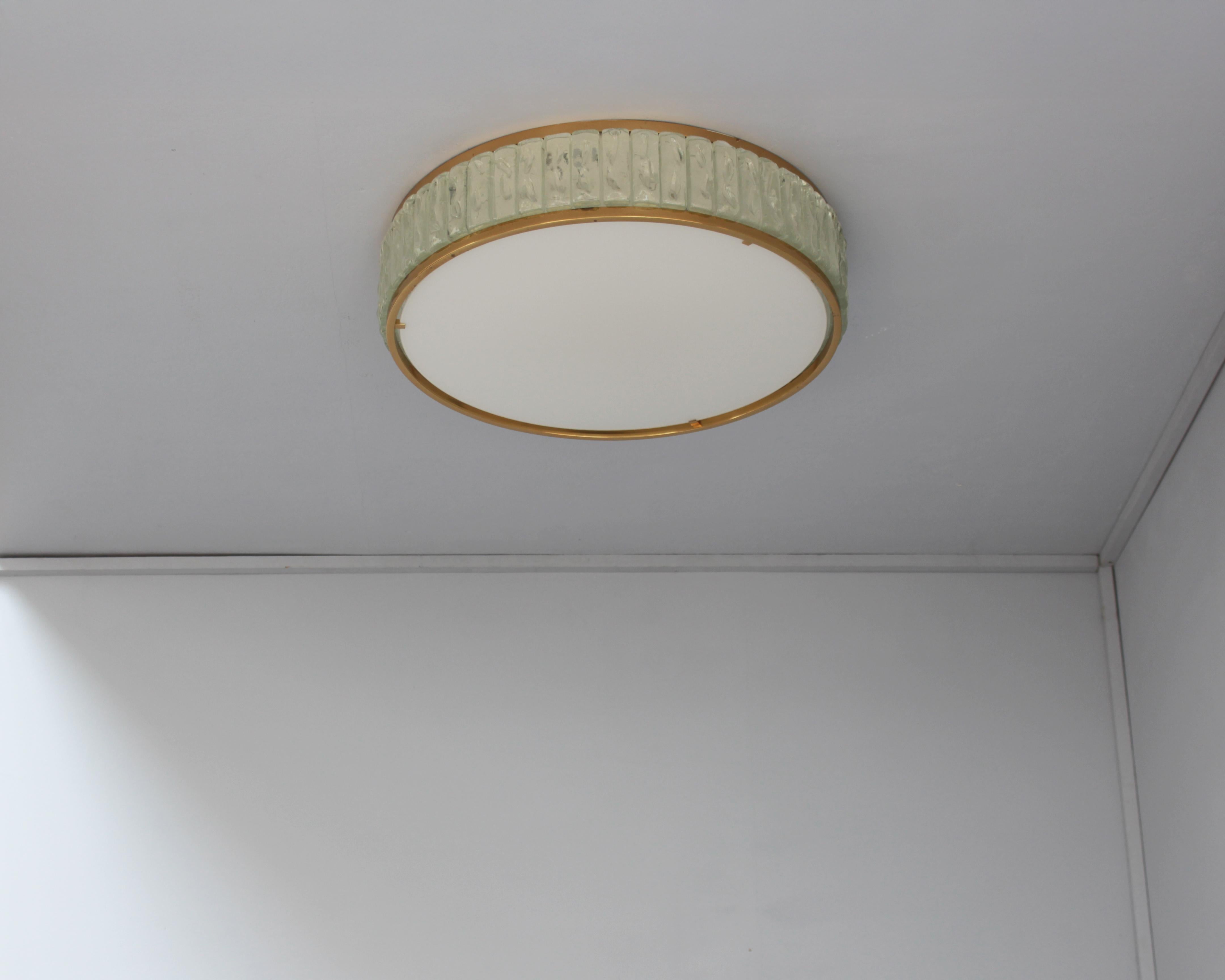 Monture affleurante en laiton et verre 