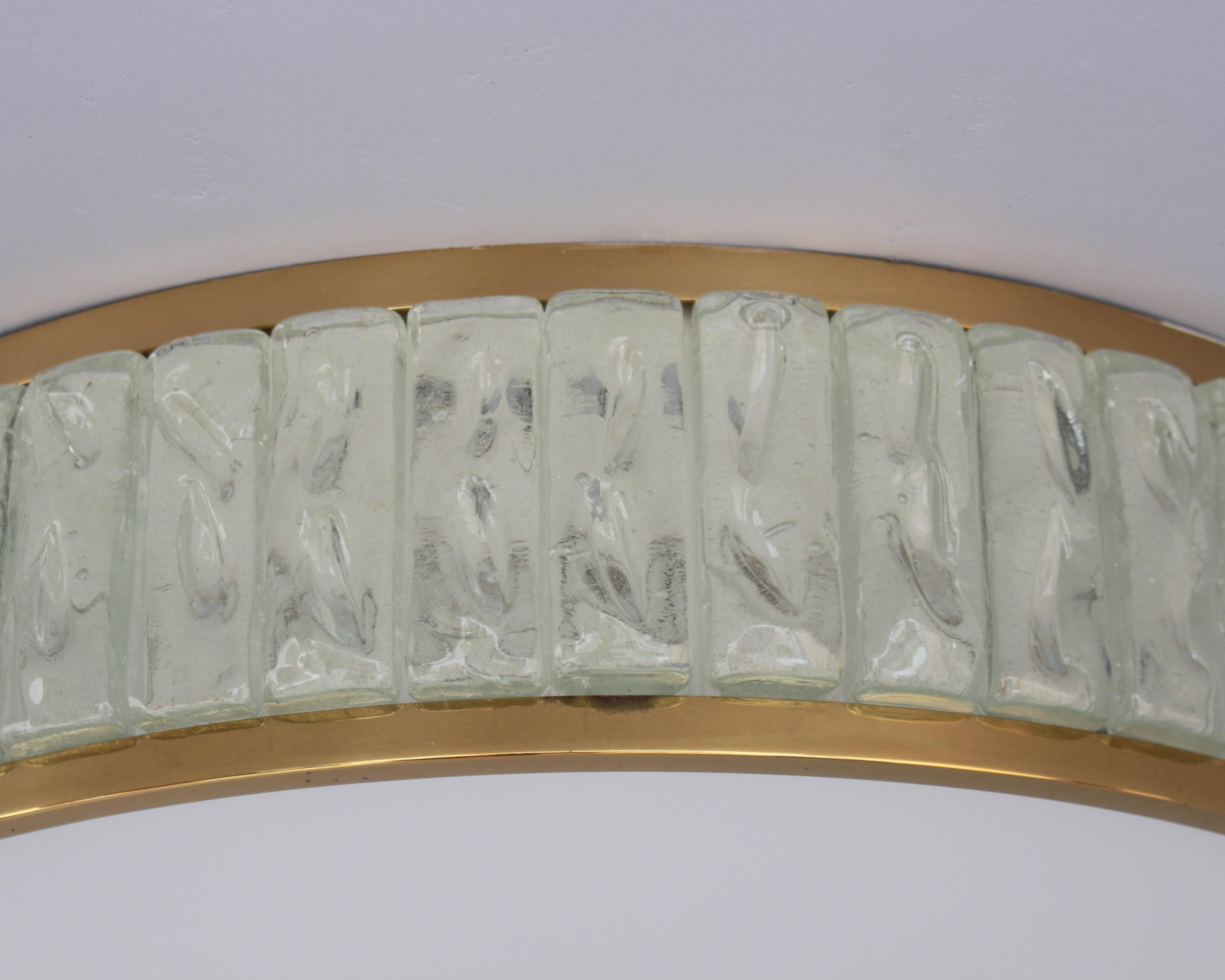 Monture affleurante en laiton et verre 