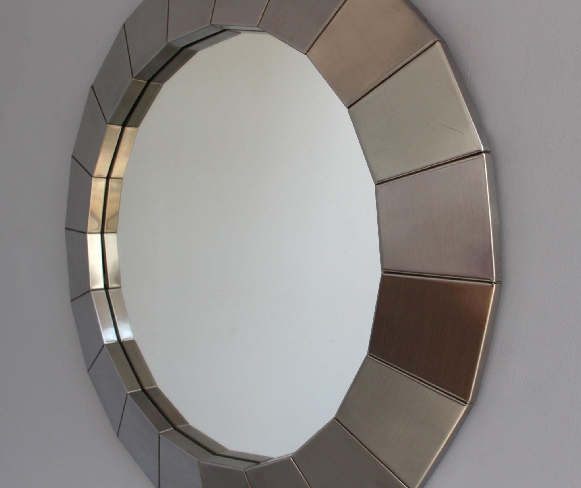 round faceted mirror