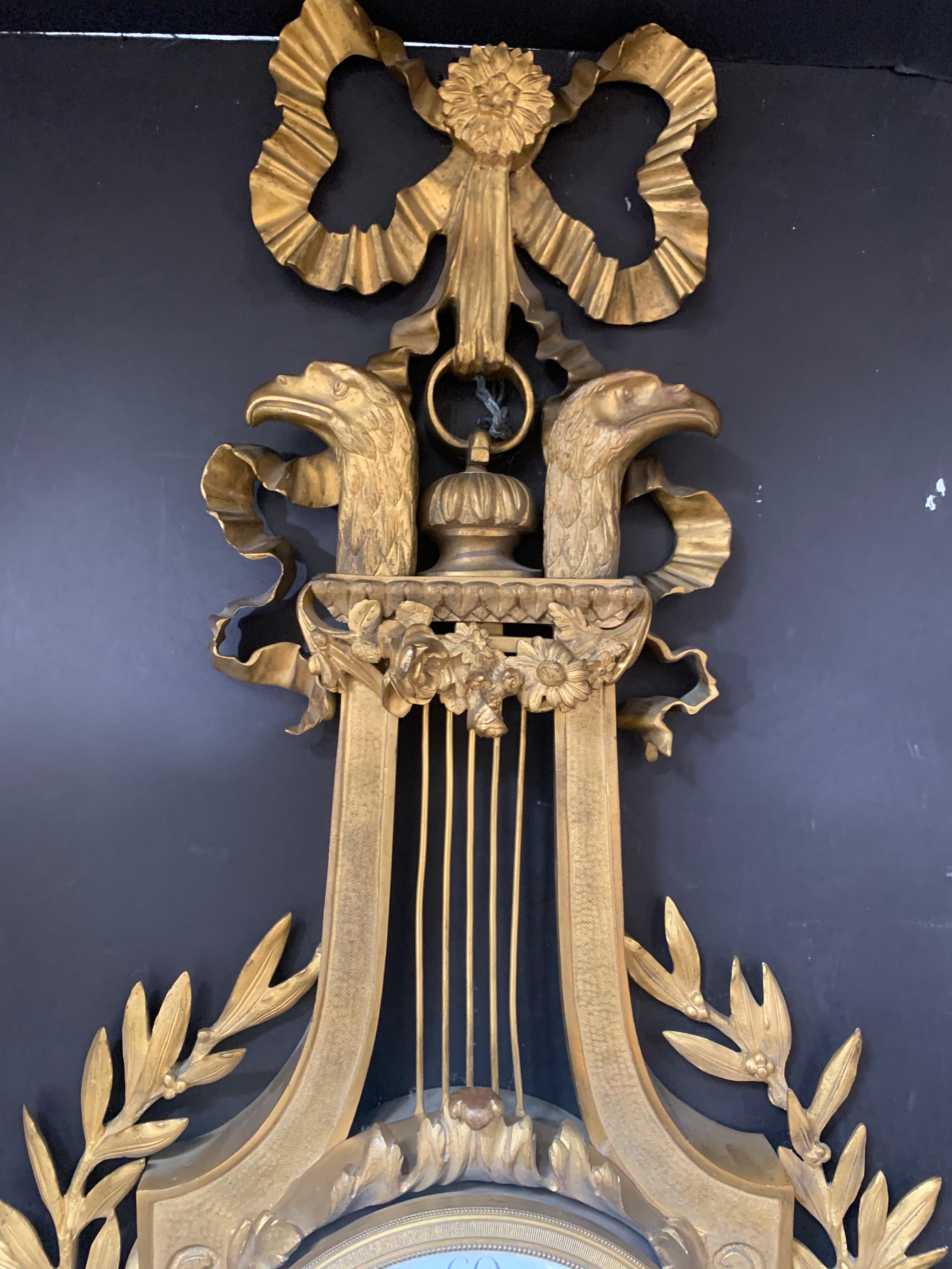 Fine French 19th Century Gilt Bronze Bow Top Cartel Wall Clock Birds of Prey In Good Condition In Roslyn, NY