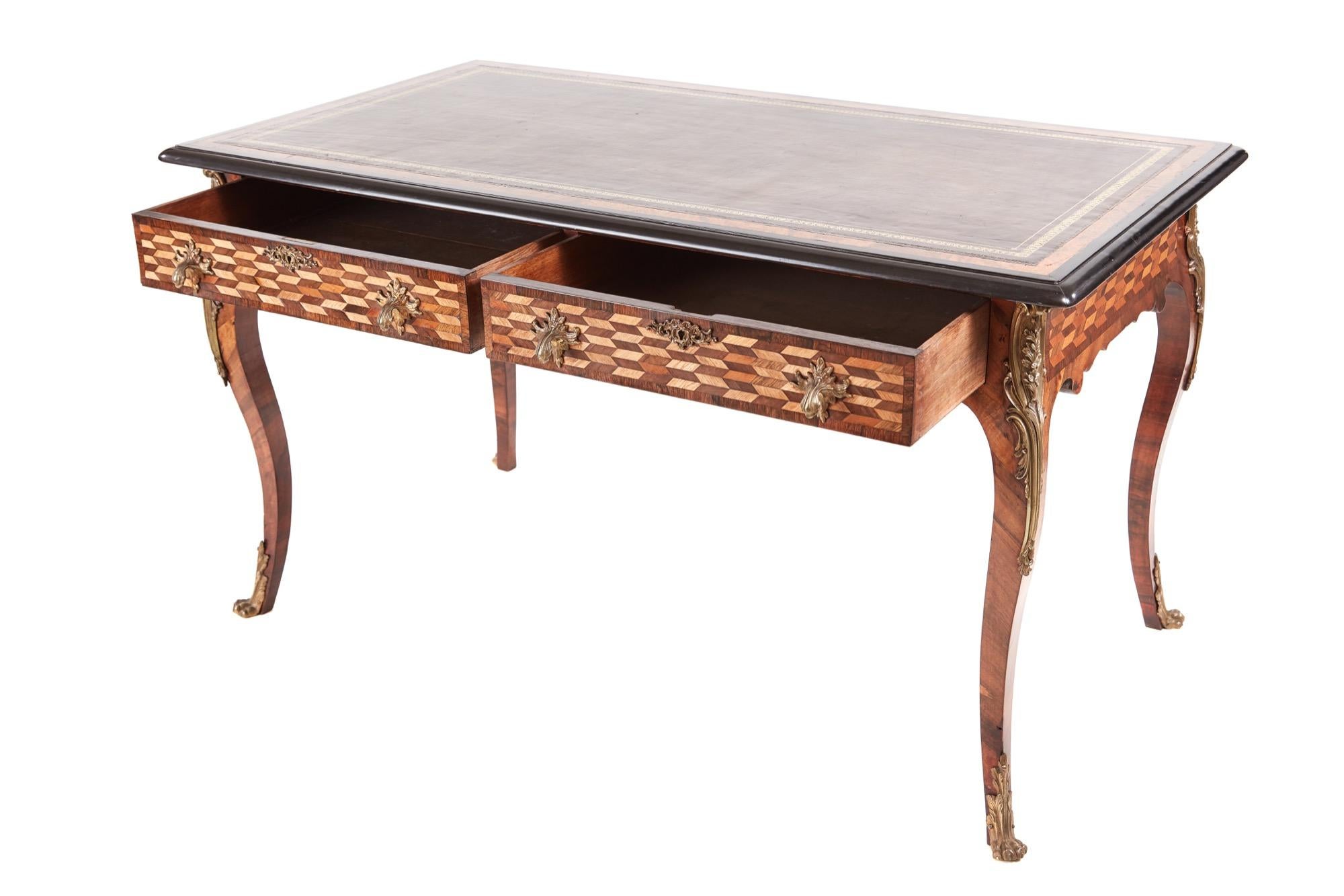 Fine French 19th century Victorian parquetry and ormolu-mounted bureau plat desk. This exceptional piece is striking to look at with a leather top crossbanded in burr walnut, two drawers to the front with parquetry inlay and ormolu handles, two