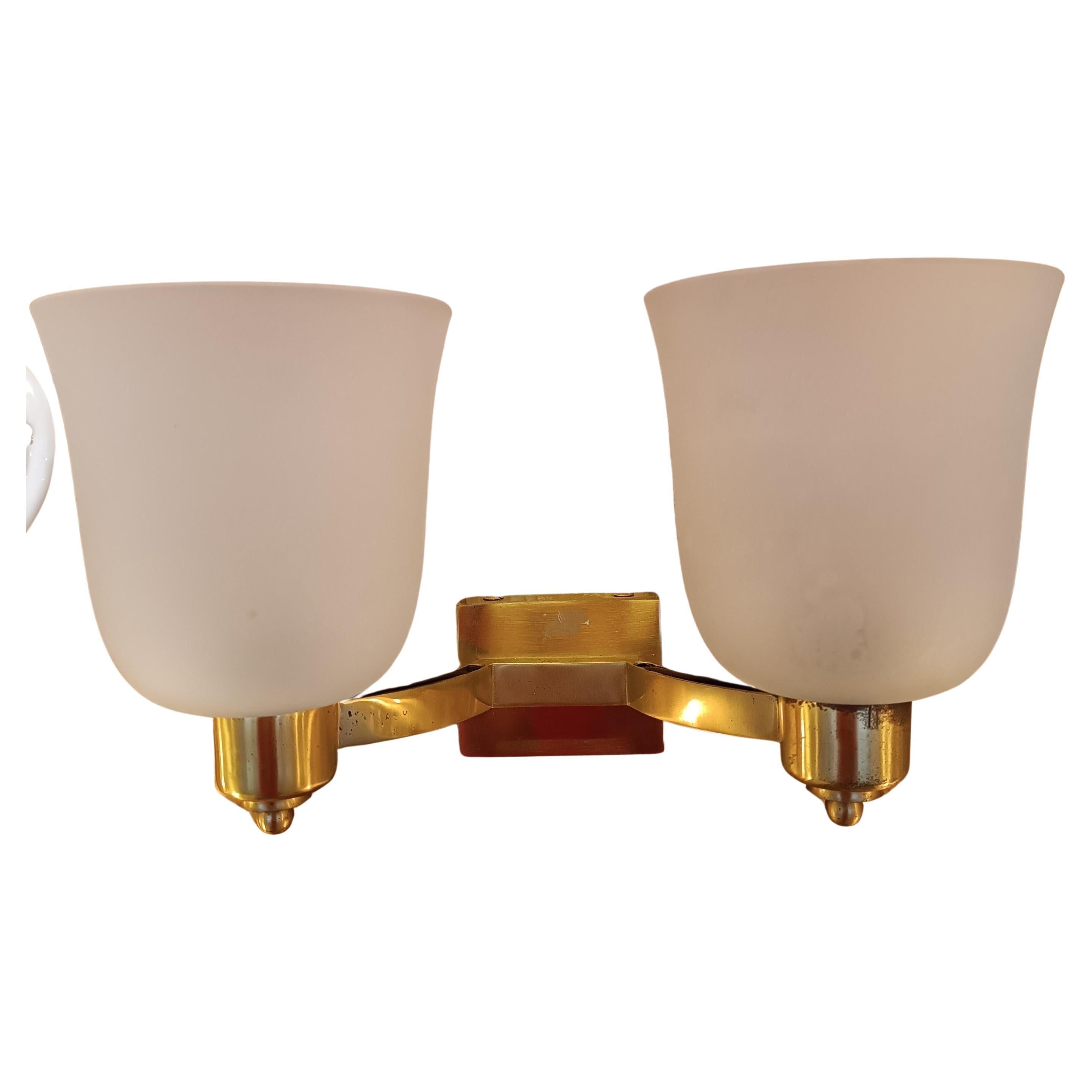 Fine French Art Deco brass sconce by Jean Perzel 1950s