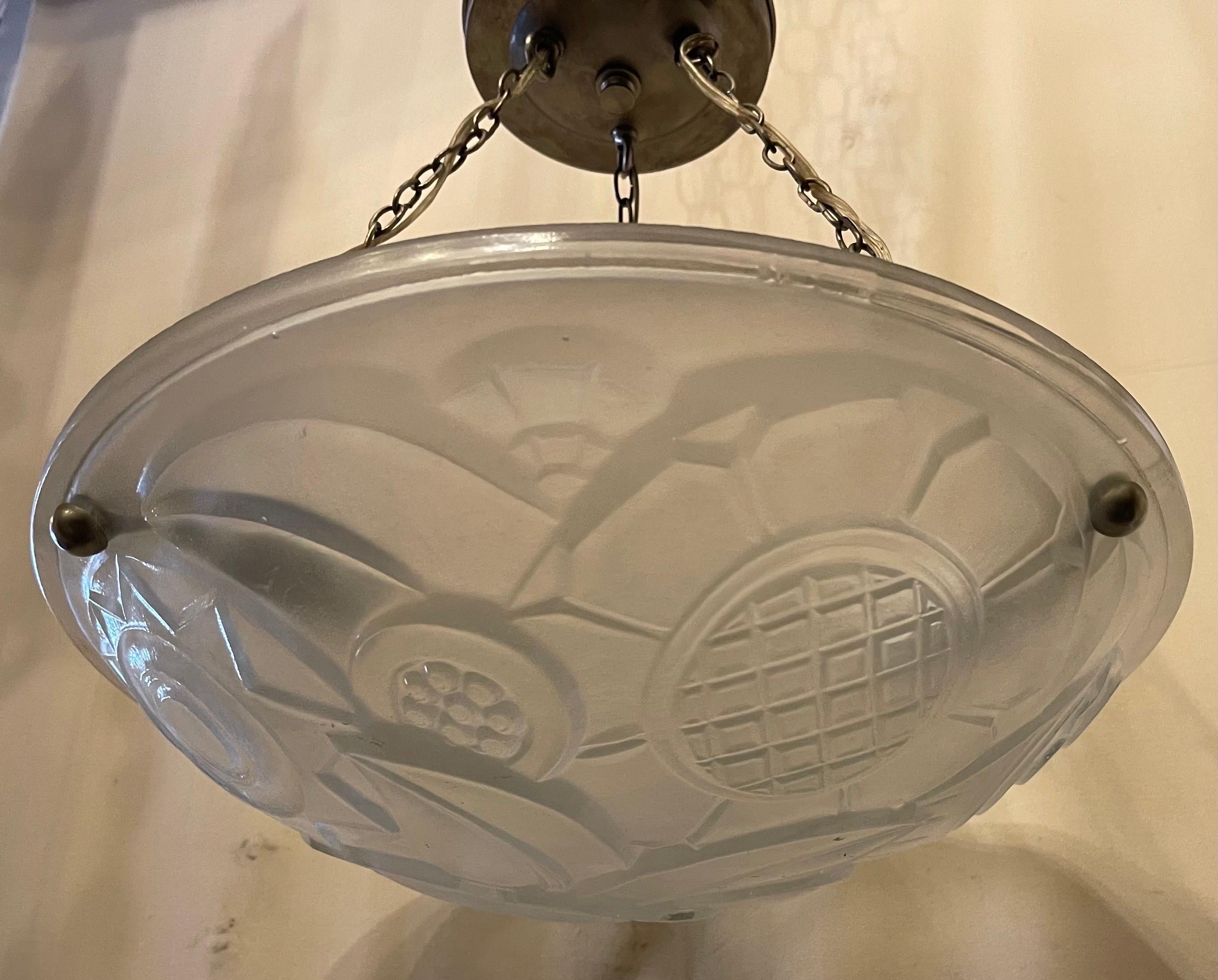 A wonderful French Art Deco frosted glass pendent semi flush three-light nickel fixture in the manner of Sabino
Height is adjustable.