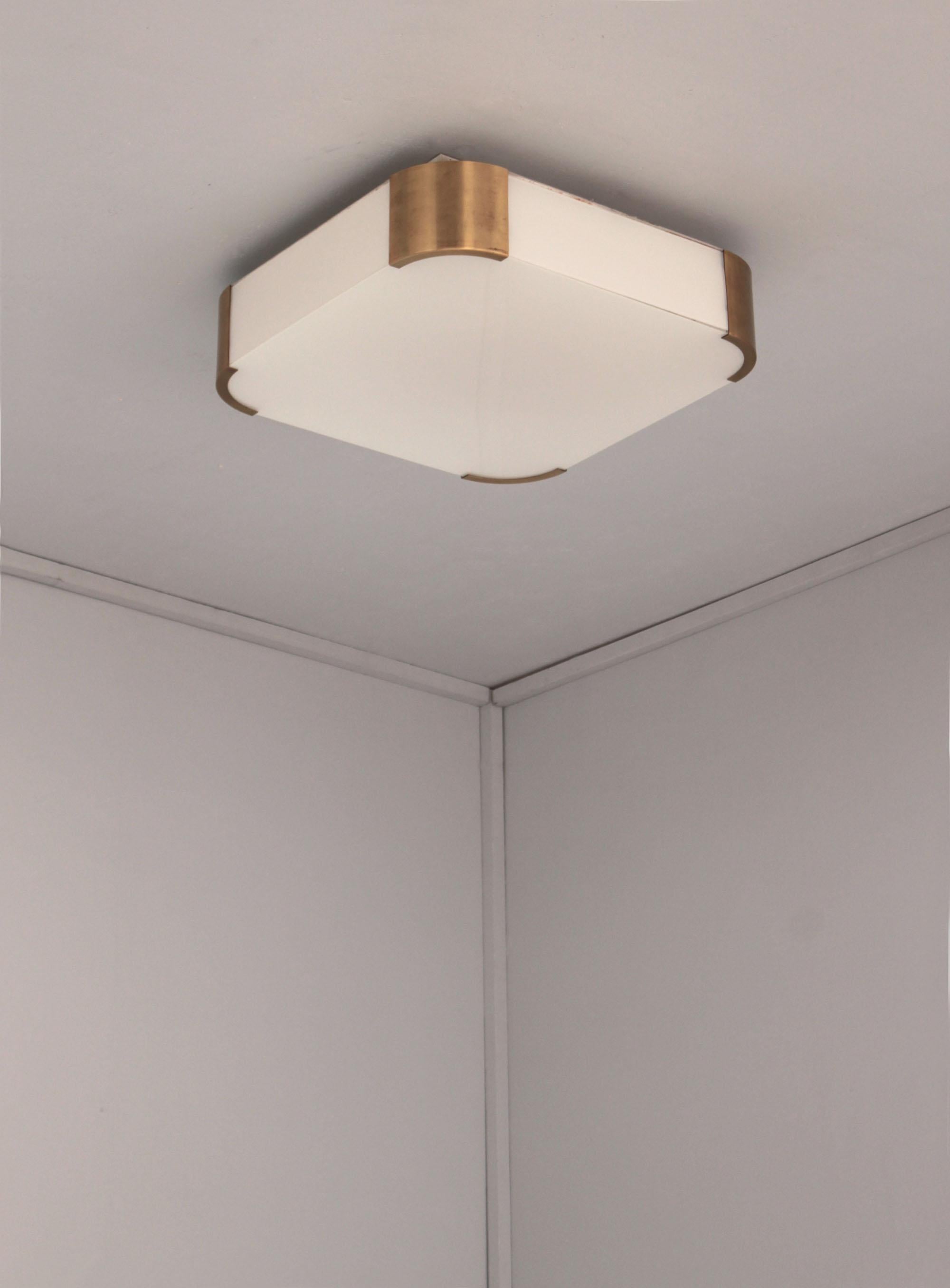 Atelier Perzel - A fine French Art Deco enameled glass and gilded bronze square ceiling or wall light with rounded corners.