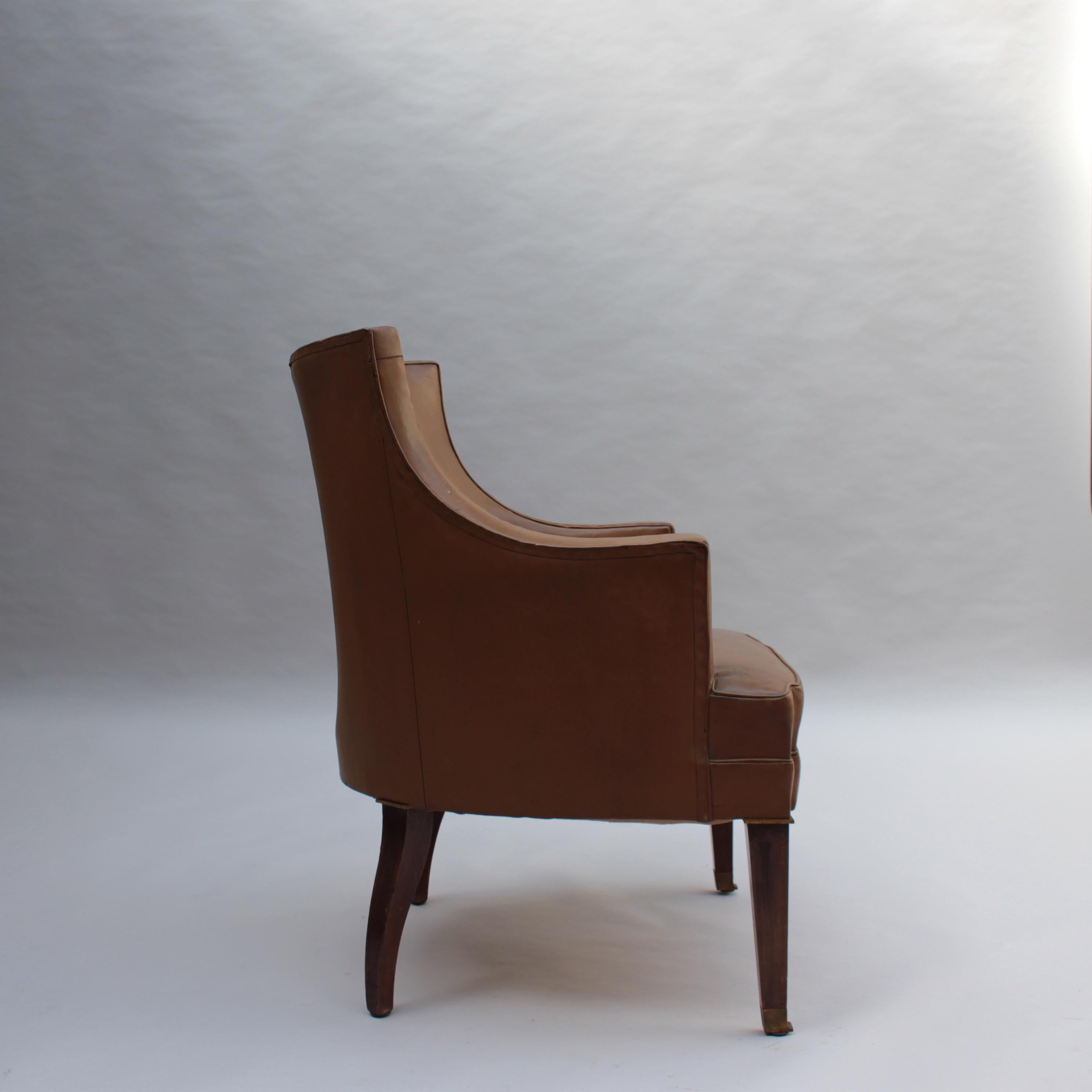 Fine French 1950s Mahogany and Leather Armchair by Jacques Quinet In Good Condition For Sale In Long Island City, NY