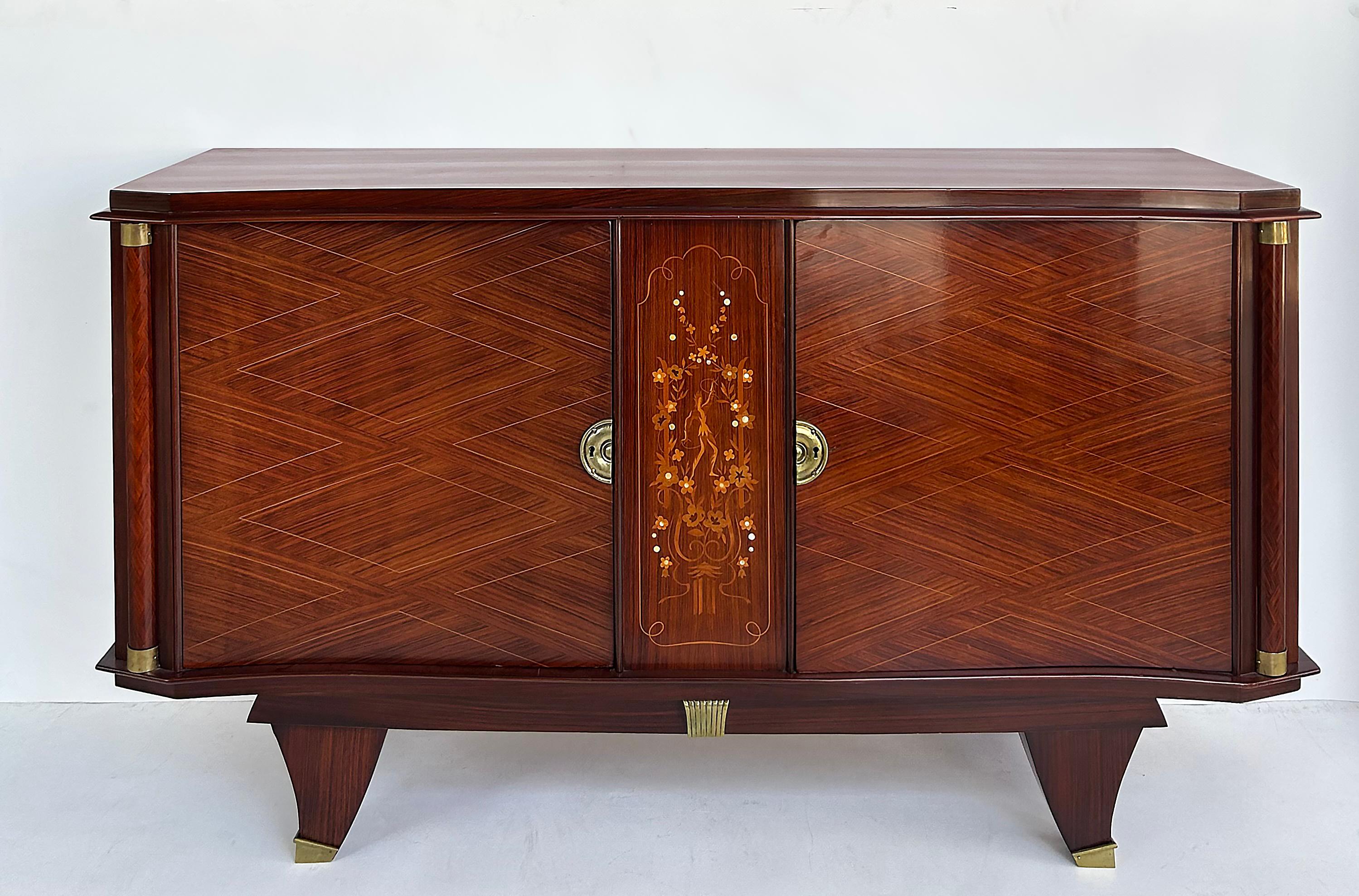 Fine French Art Deco Marquetry Inlay Cabinet, Jules Leleu Attributed 

Offered for sale is a fine French Art Deco cabinet with marquetry inlay, columns, and bronze mounts that is attributed to Jules Leleu as it is unsigned. The two cabinet doors