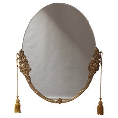 Fine French Art Deco Oval Mirror with a Solid Brass Frame