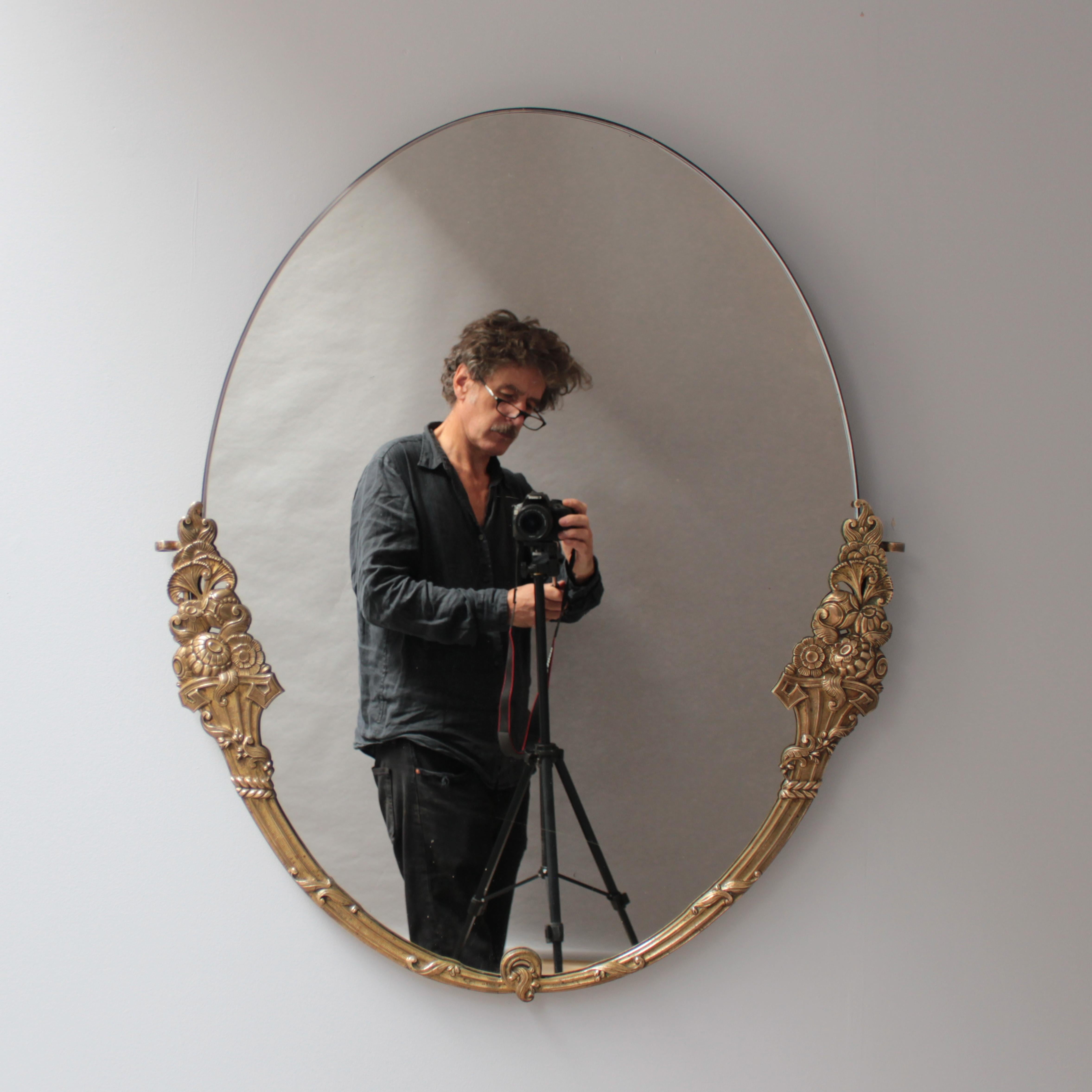 Rococo Fine French Art Deco Oval Mirror with a Solid Brass Frame For Sale