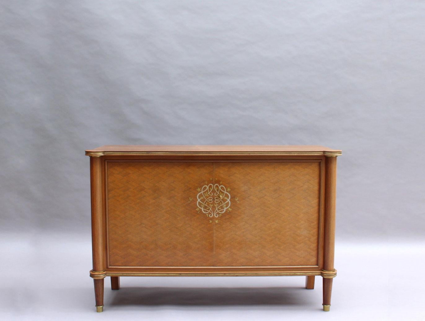 Jules Leleu: A fine French Art Deco Palisander and marquetry buffet / commode with bronze details.
Signed.