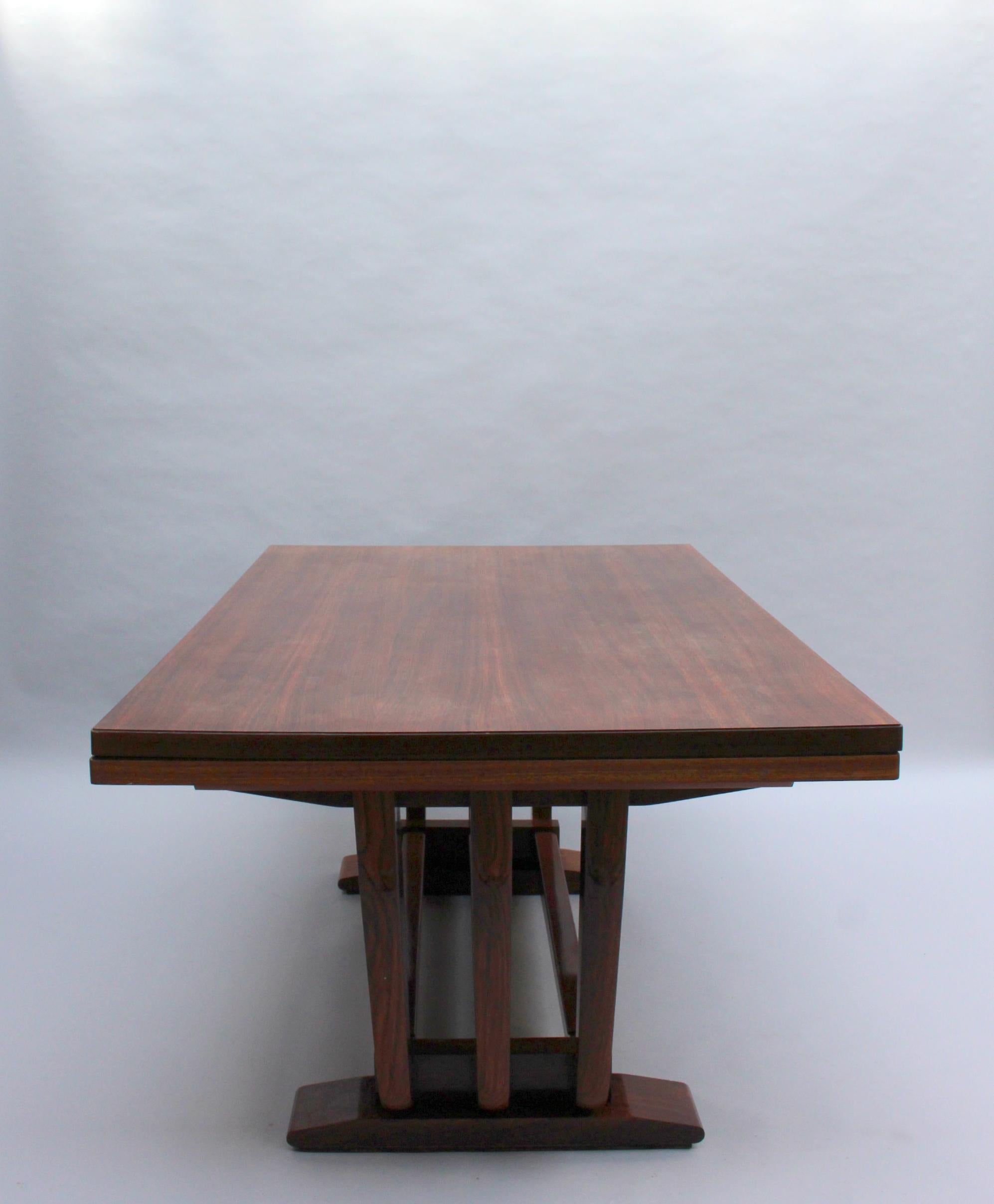 A fine French Art Deco rosewood dining / writing table by Maxime Old.
Leaves are not usable.
Signed.