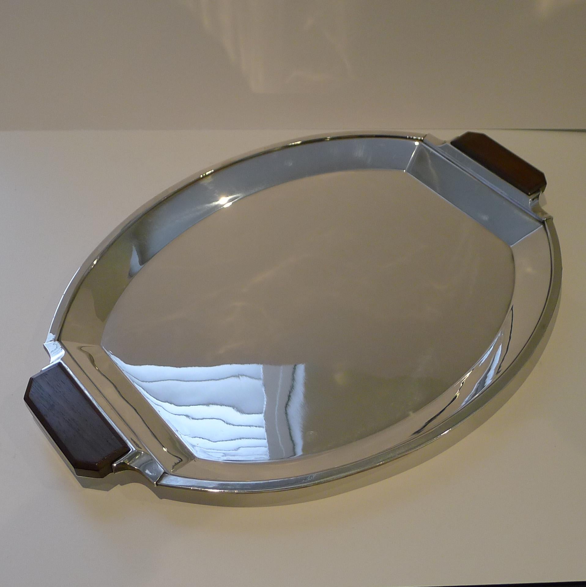 An outstanding and very stylish art deco silver plated tray by one of the world's finest silversmith's, Christofle as part of their O Gallia range between 1931-1935 based on the mark struck on the underside.

It has just returned from my