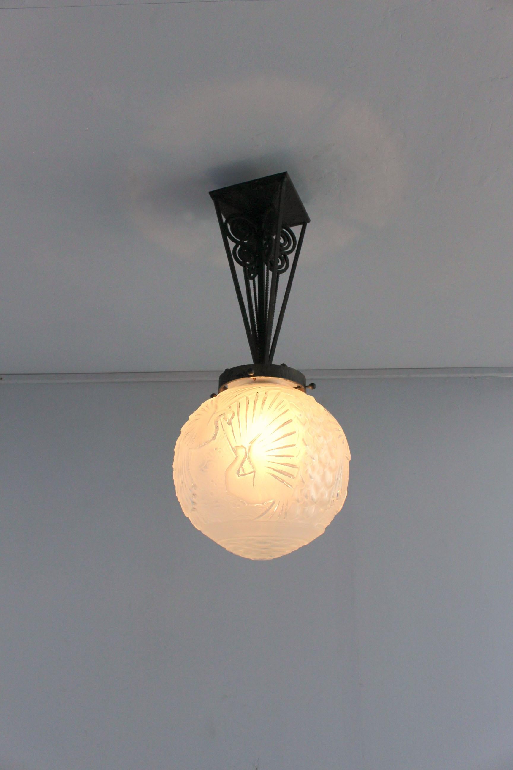 Early 20th Century Fine French Art Deco Wrought Iron and Frosted Glass Pendant by Muller Frères For Sale