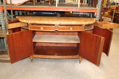 Buffet Directoire Brèche D'' Alep à dessus en marbre et portes en faux tambour.