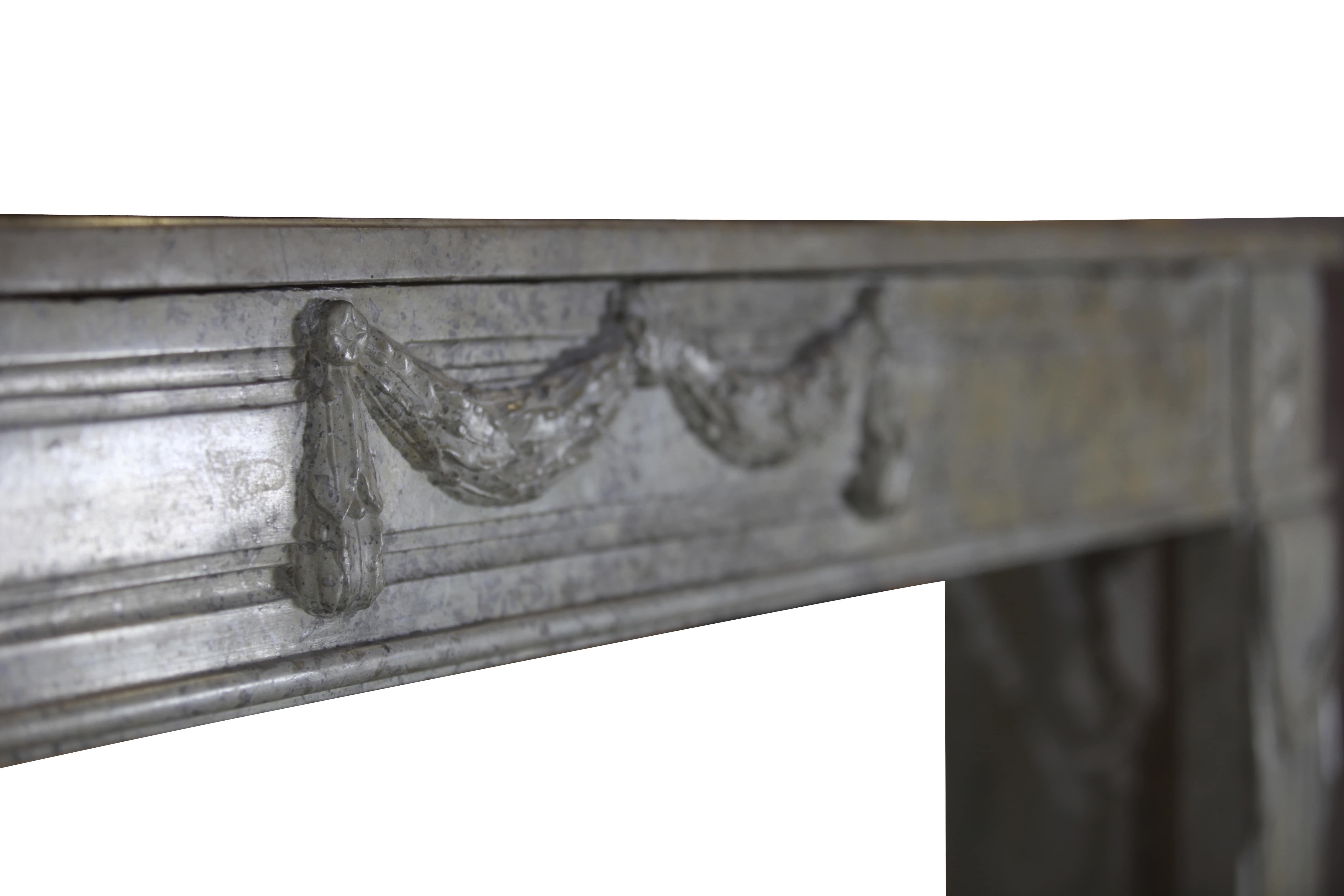A fine antique 18th century marble antique fireplace surround of the Directoire period. It was installed in a corner. See the marks on the shelf. This Classic stylish mantelpiece was build in the late 18th century.
Measures:
167 cm exterior width
