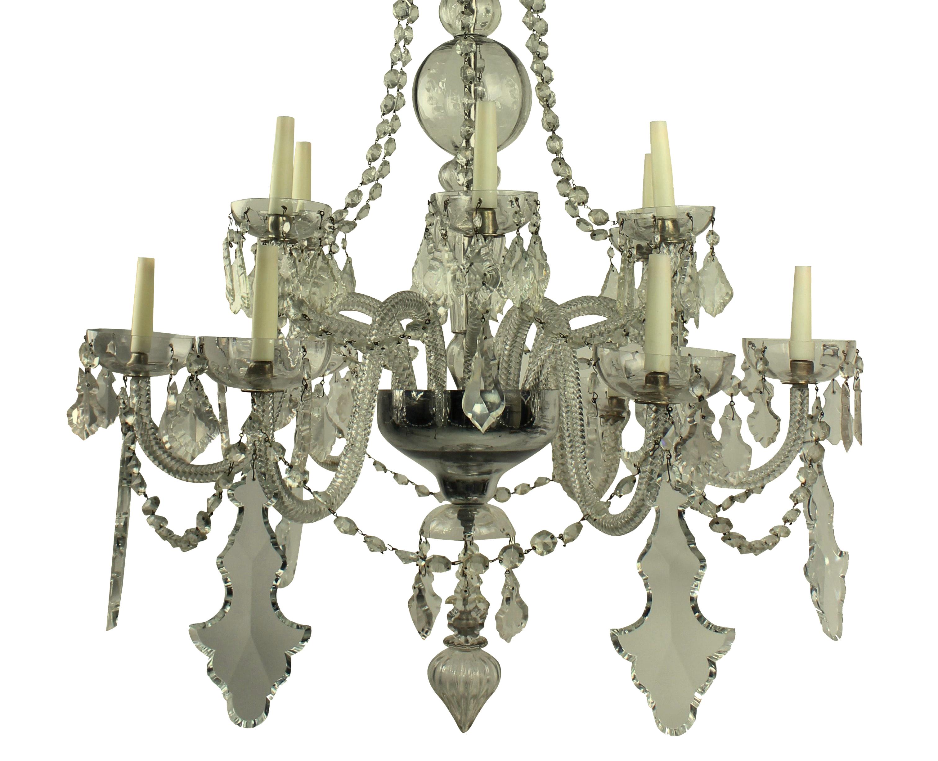 A fine French cut glass chandelier of good proportions, hung throughout with plaques and swags.