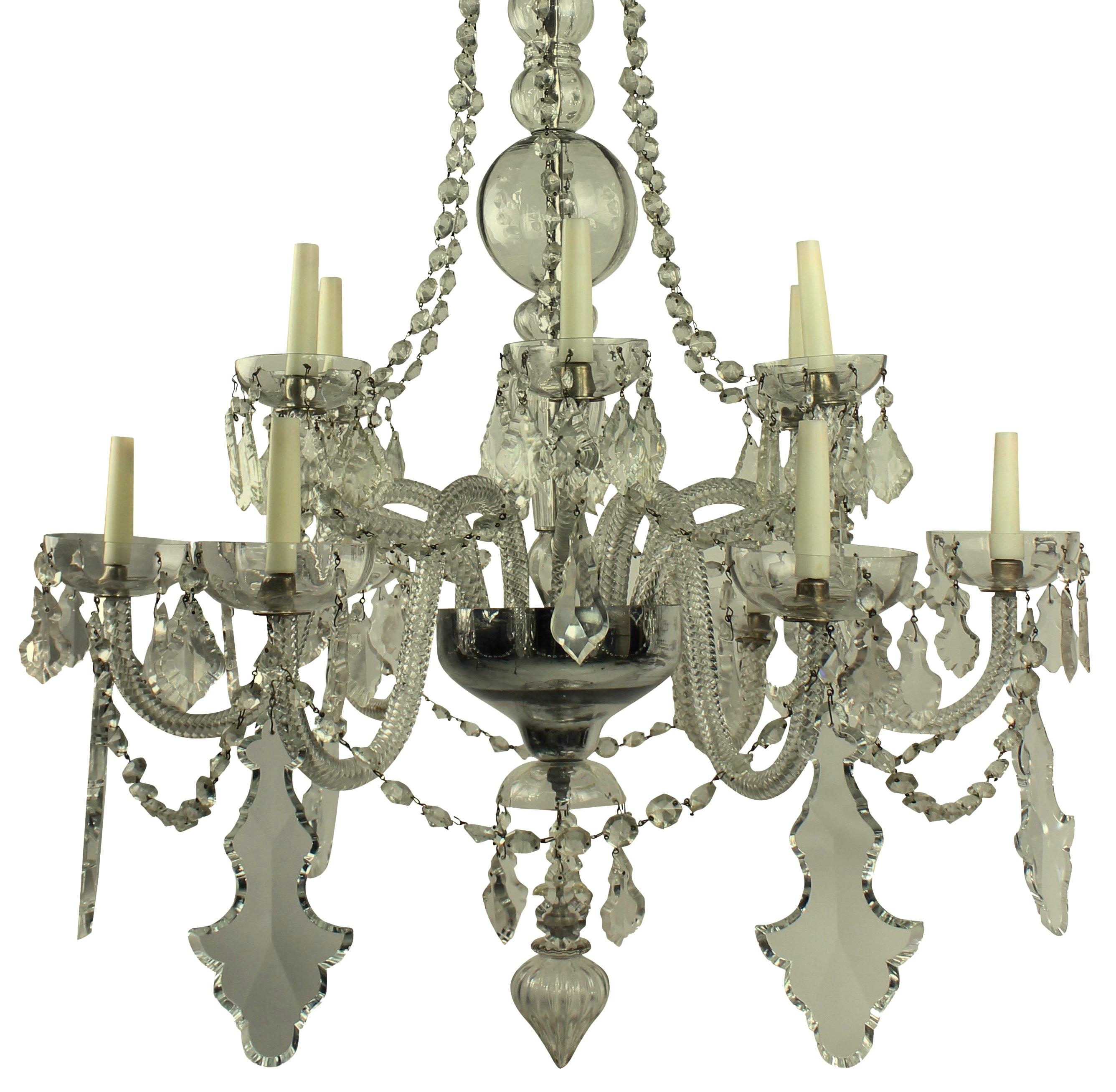 A fine French cut-glass chandelier of good proportions, hung throughout with plaques and swags.