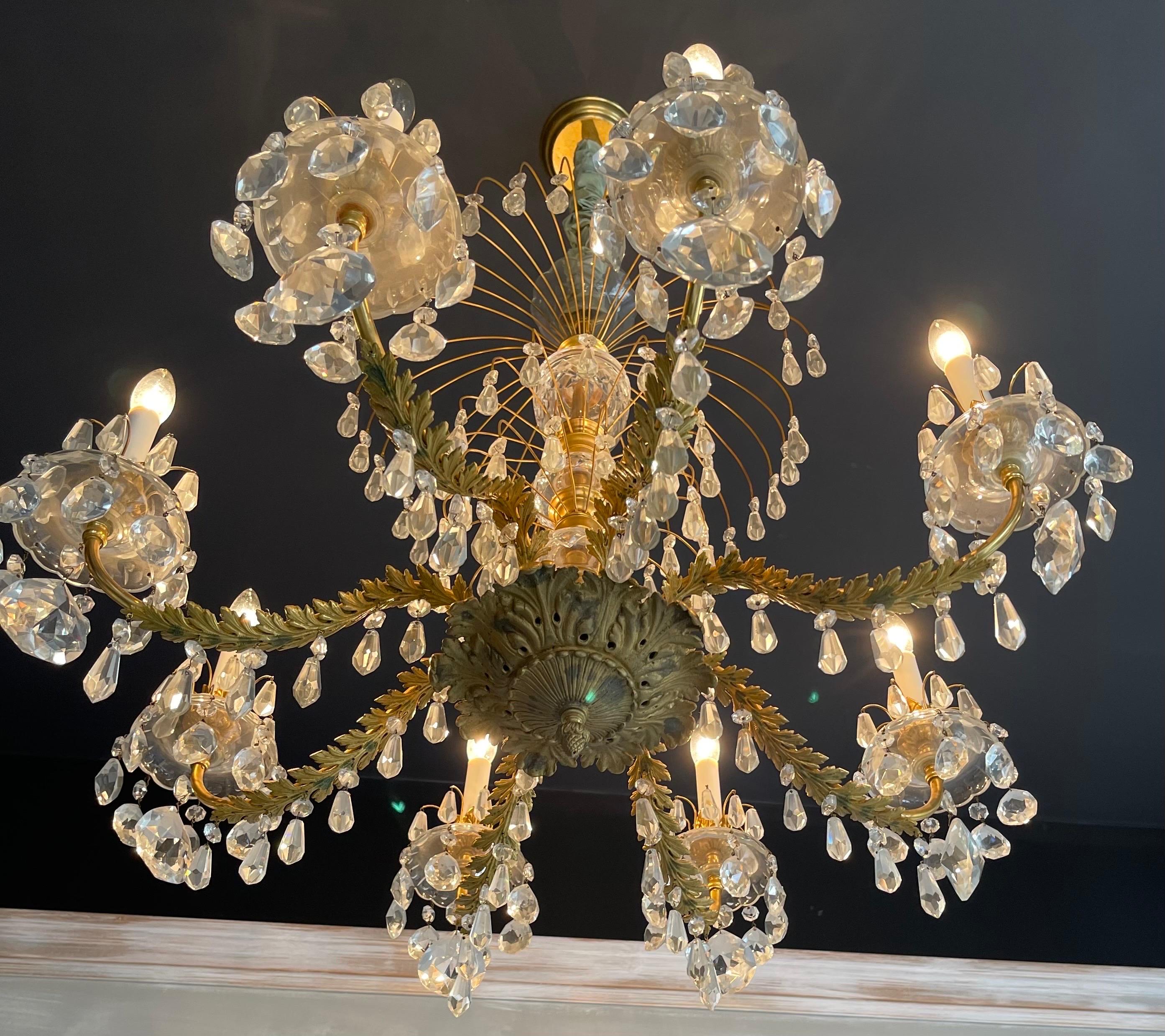 A wonderful French Empire / neoclassical / Regency dore bronze & crystal 8 light chandelier in the manner of Baccarat.
 