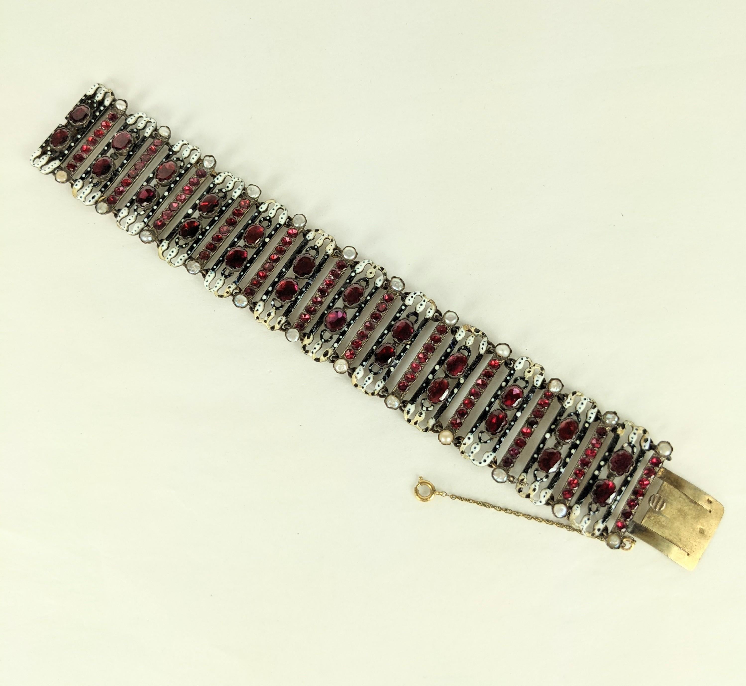Exceptional French Garnet and Enamel 19th Century Bracelet of fine enamel, foiled back garnets with natural pearls. French manufacture with appropriate hallmarks of silver.  1850's France. Beautiful quality 19th Century jewel. 7