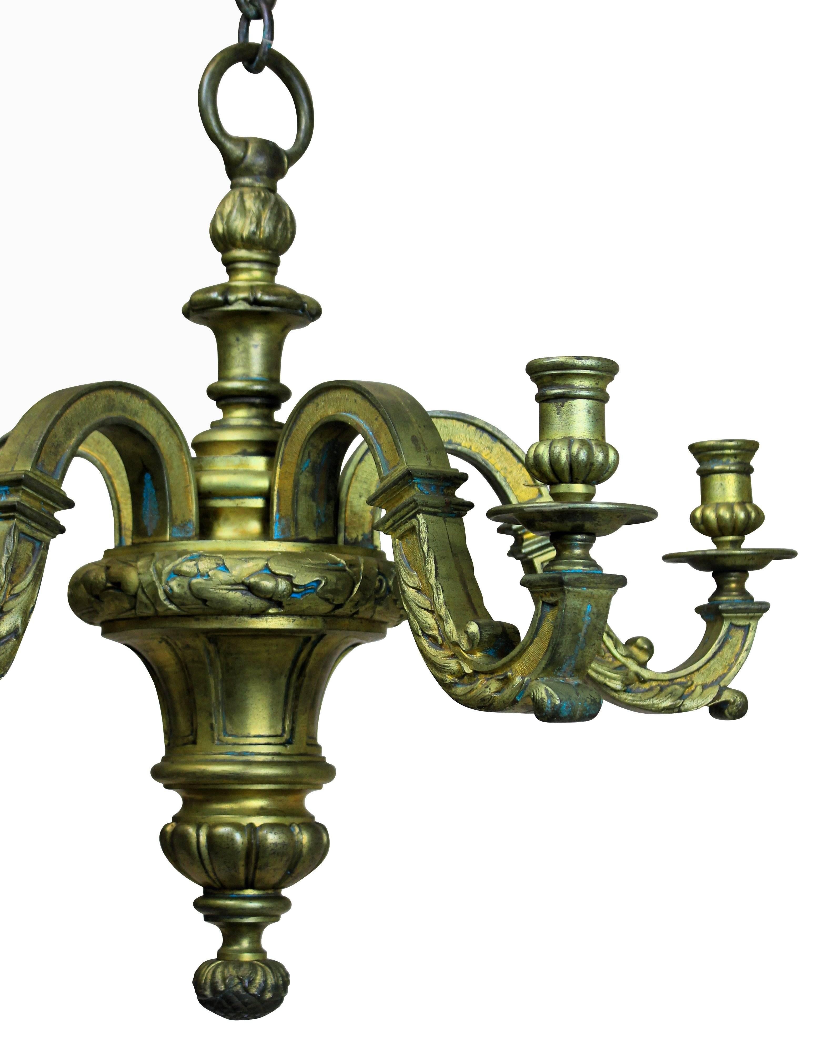 A fine English gilt bronze chandelier of five branches with classical acanthus decoration.

 