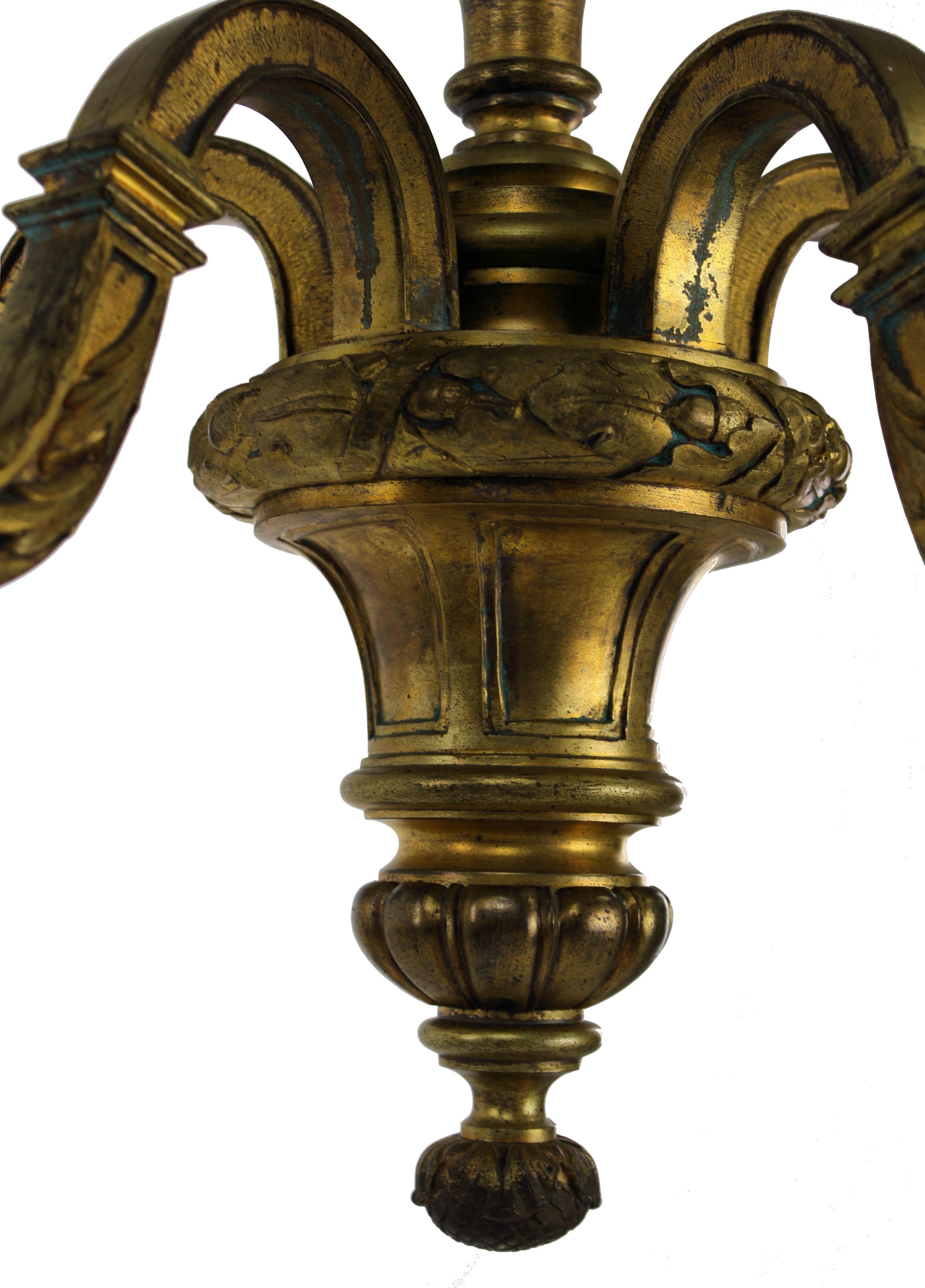 A fine English gilt bronze chandelier of five branches with classical acanthus decoration.

  