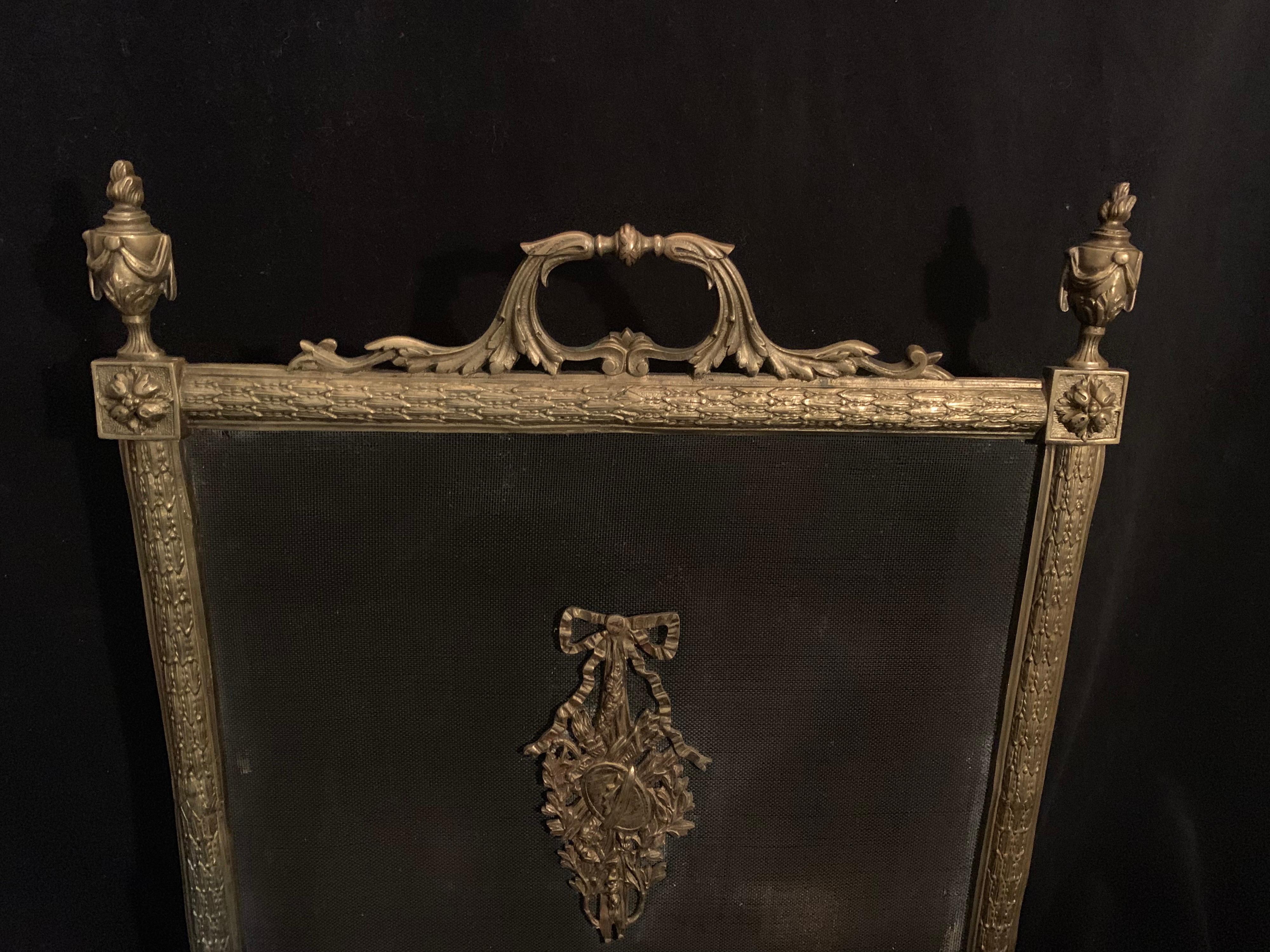 Fine French Louis XVI Gilt Bronze Fireplace Screen Urn Bow Instrument Medallion In Good Condition For Sale In Roslyn, NY