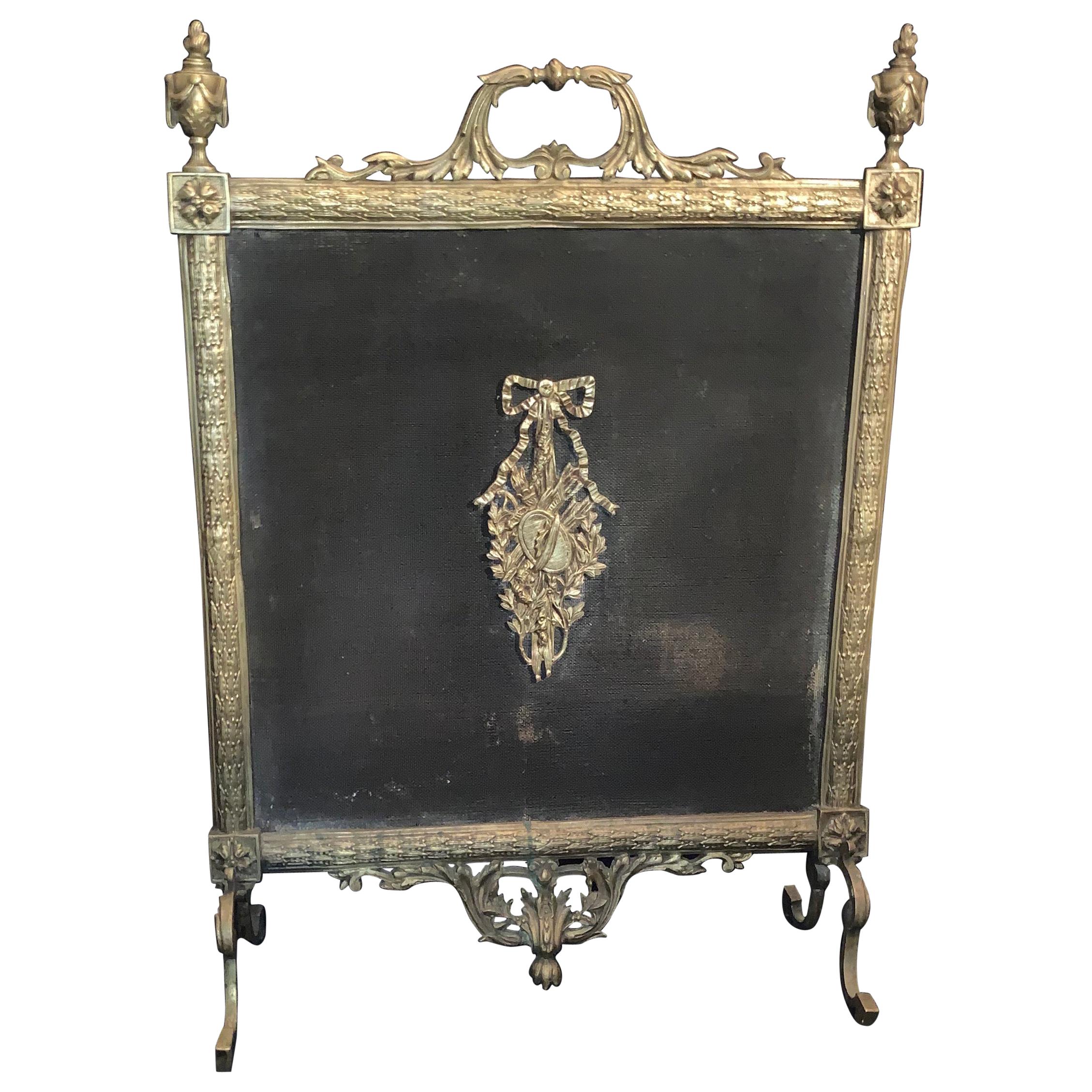 Fine French Louis XVI Gilt Bronze Fireplace Screen Urn Bow Instrument Medallion For Sale