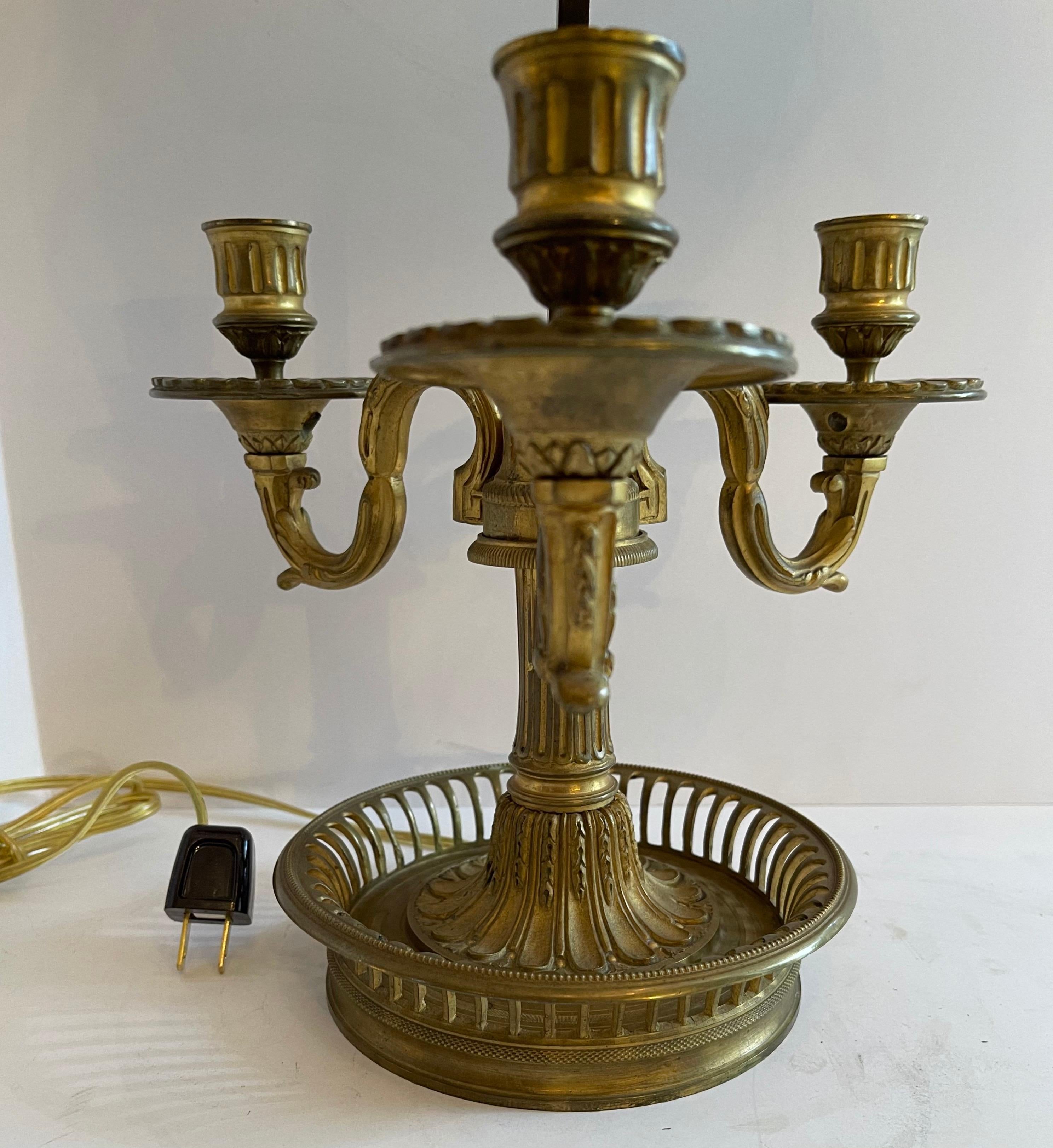 A very fine quality French neoclassical bronze three candelabra bouillotte lamp with silk shade
Interior is outfitted with two candelabra sockets, completely rewired.