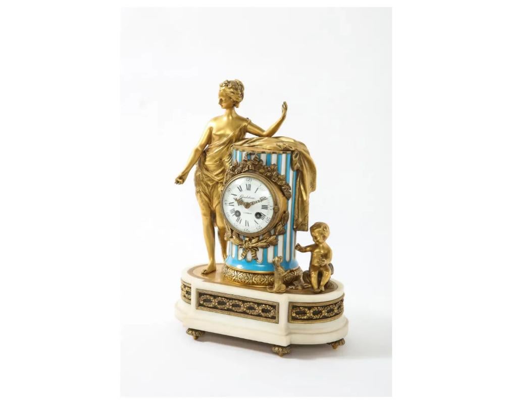 Französische Uhr „Marie Antoinette“ aus Goldbronze, Marmor und Porzellan im Sevres-Stil (19. Jahrhundert) im Angebot