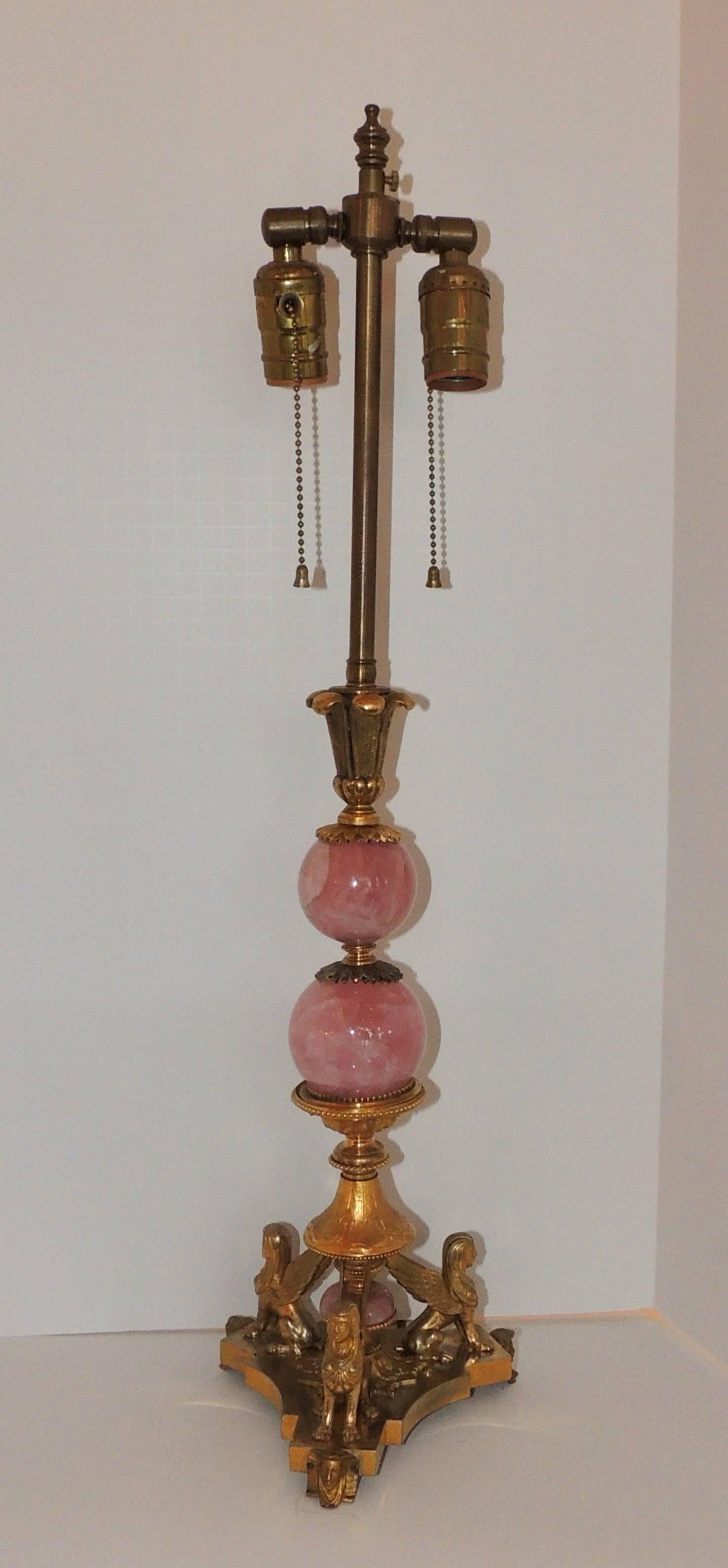 A wonderful French Regency Empire gilt bronze neoclassical rose quartz rock crystal lamp.
In the manner of E.F. Caldwell

Measures: 26
