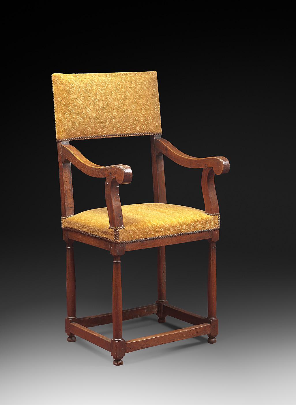 Origin: France
Period: Second half of the 16th century, Henri II 

Measures: Height 119 cm
Seat height 58 cm 
Length 55 cm
Depth 51.5 cm
 
Walnut wood

Good condition

Yellow raised velvet 


This armchair stands on four Doric columns