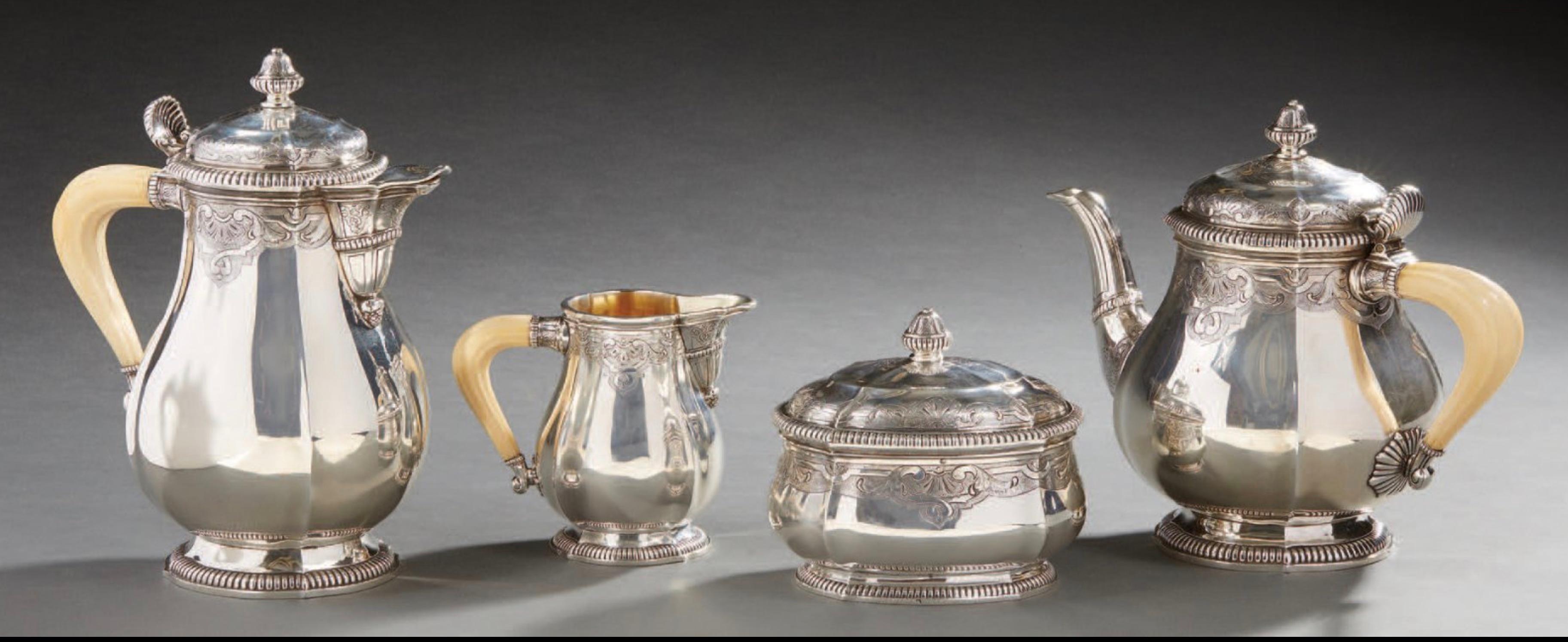 A magnificent, fine and impressive antique French 950 standard silver four piece tea and coffee set and coffee service with pattern with decoration. The set includes a coffee pot, a teapot, a covered sugar pot and a creamer.
Ivory handle for each