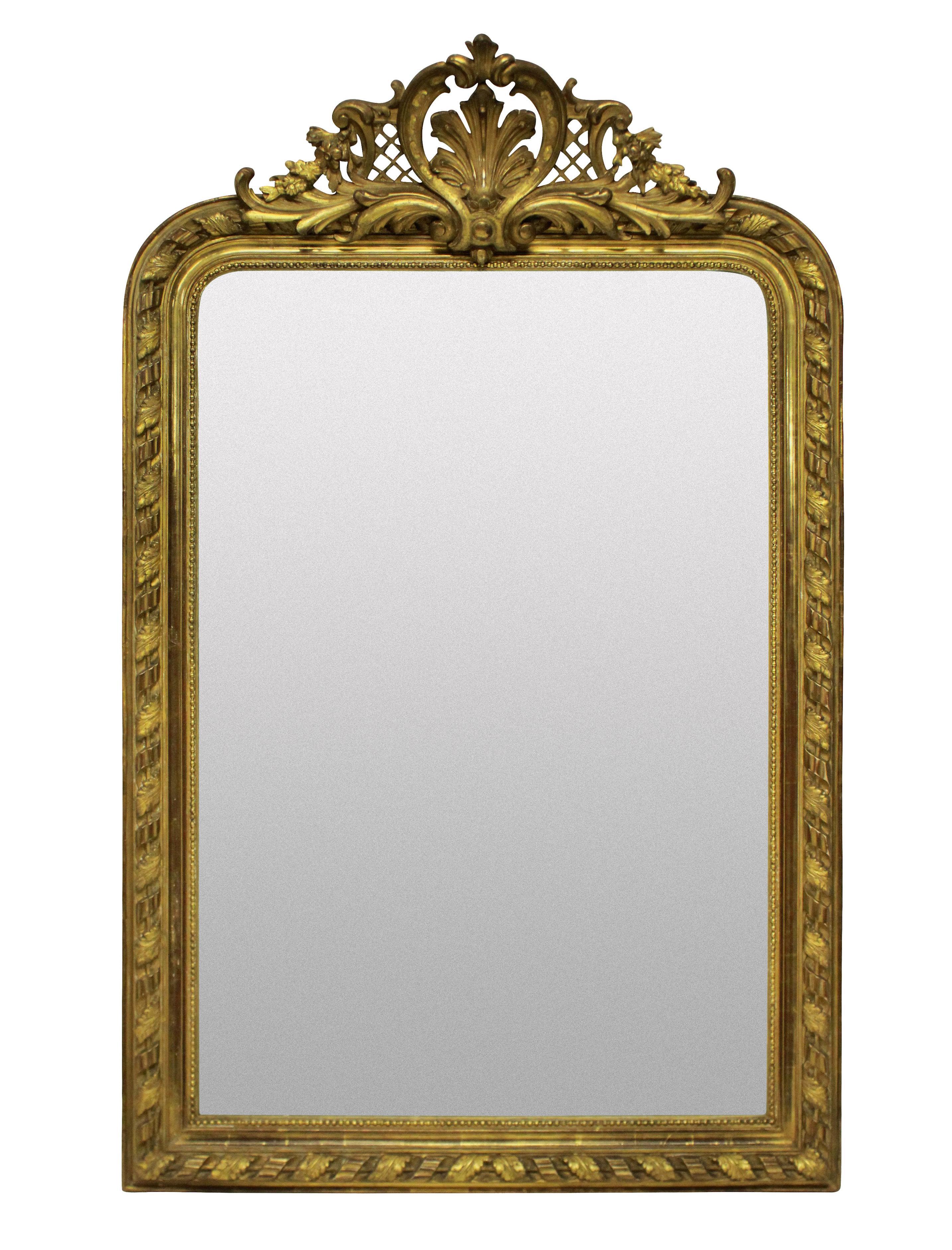 A fine French carved and water gilded overmantel (fireplace) mirror with carved and gesso central cartouche.

 
