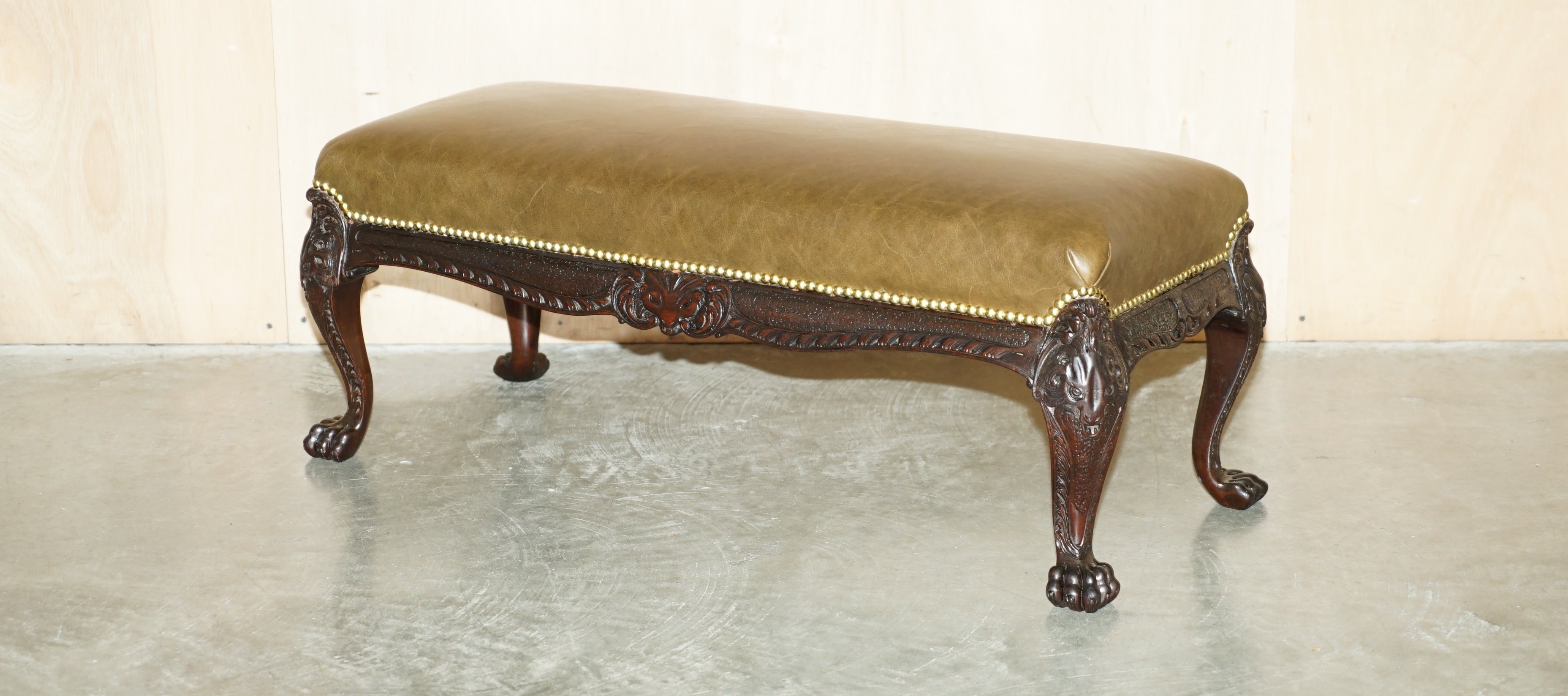 Royal House Antiques

Royal House Antiques is delighted to offer for sale this sublime, ornately hand carved circa 1860 Lions Hairy Paw feet and main, footstool or ottoman with new brown leather upholstery 

Please note the delivery fee listed is