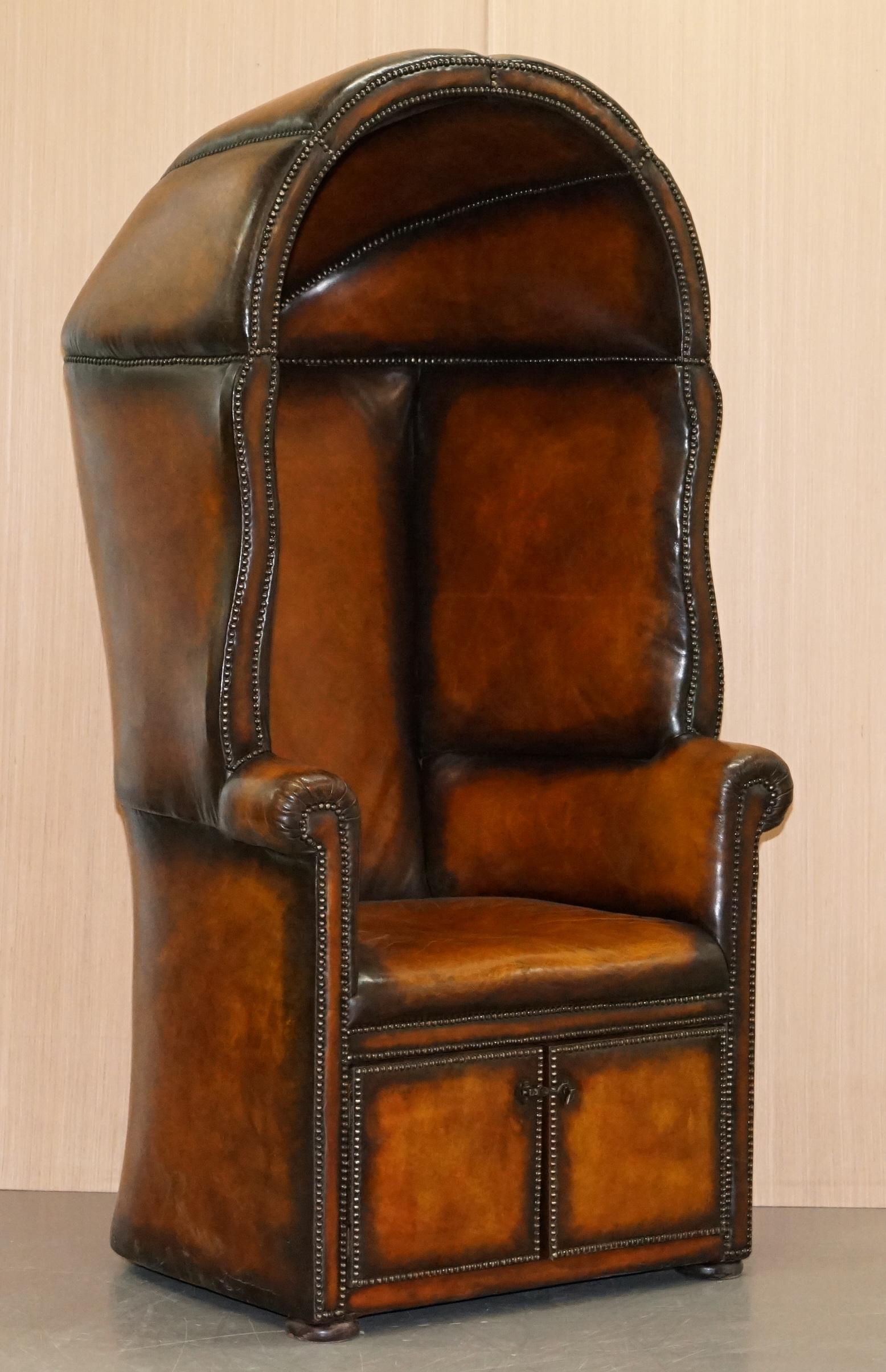 We are delighted to offer for sale this stunning very rare hand dyed brown leather Regency / Victorian full Porters armchair

An absolute diamond of an armchair, this is a full porters so it has the canopy top which is fully fluted both inside and