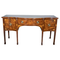 Aparador de estilo Jorge III, de caoba, madera satinada y palisandro con incrustaciones